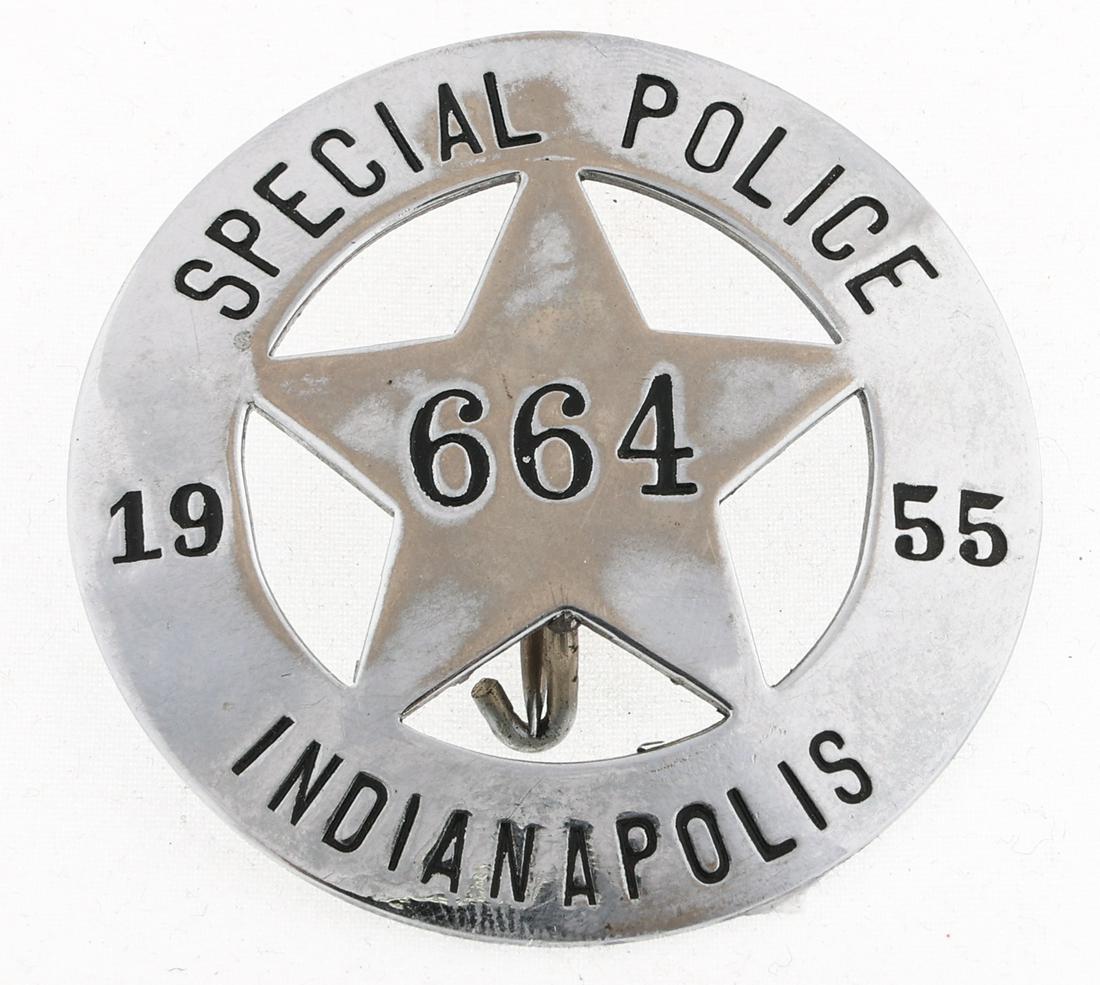 1955 INDIANAPOLIS INDIANA SPECIAL POLICE BADGE NO. 664: 1955 INDIANAPOLIS INDIANA SPECIAL POLICE BADGE NO. 664 Obsolete 1955 Indianapolis, Indiana Special Police badge. Number 664. Unmarked. Measurements: 2 x 2"
