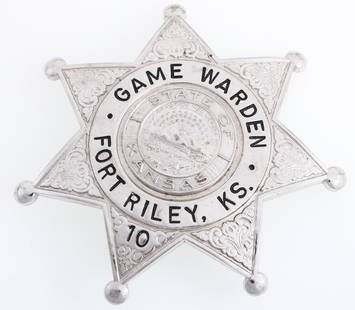 FORT RILEY KANSAS GAME WARDEN BADGE NO. 10: FORT RILEY KANSAS GAME WARDEN BADGE NO. 10 Obsolete Fort Riley, State of Kansas Game Warden badge. Number 10. Marked Blackinton on reverse.&nbsp; Measurements: 2.75 x 2.75"