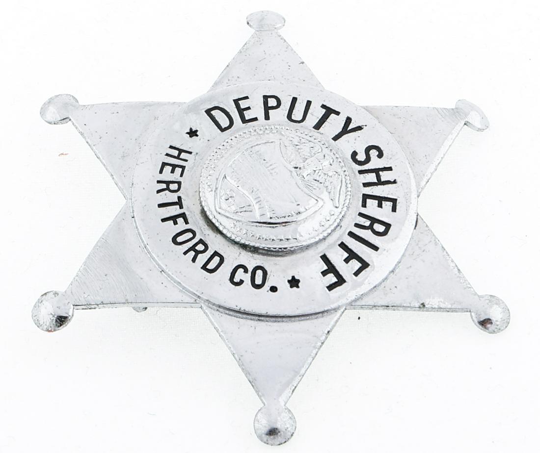 HERTFORD COUNTY NORTH CAROLINA DEPUTY SHERIFF BADGE: HERTFORD COUNTY NORTH CAROLINA DEPUTY SHERIFF BADGE Obsolete Hertford County, North Carolina Deputy badge. Marked S.G. Adams St. Louis on reverse. Measurements: 2.5 x 2.5"