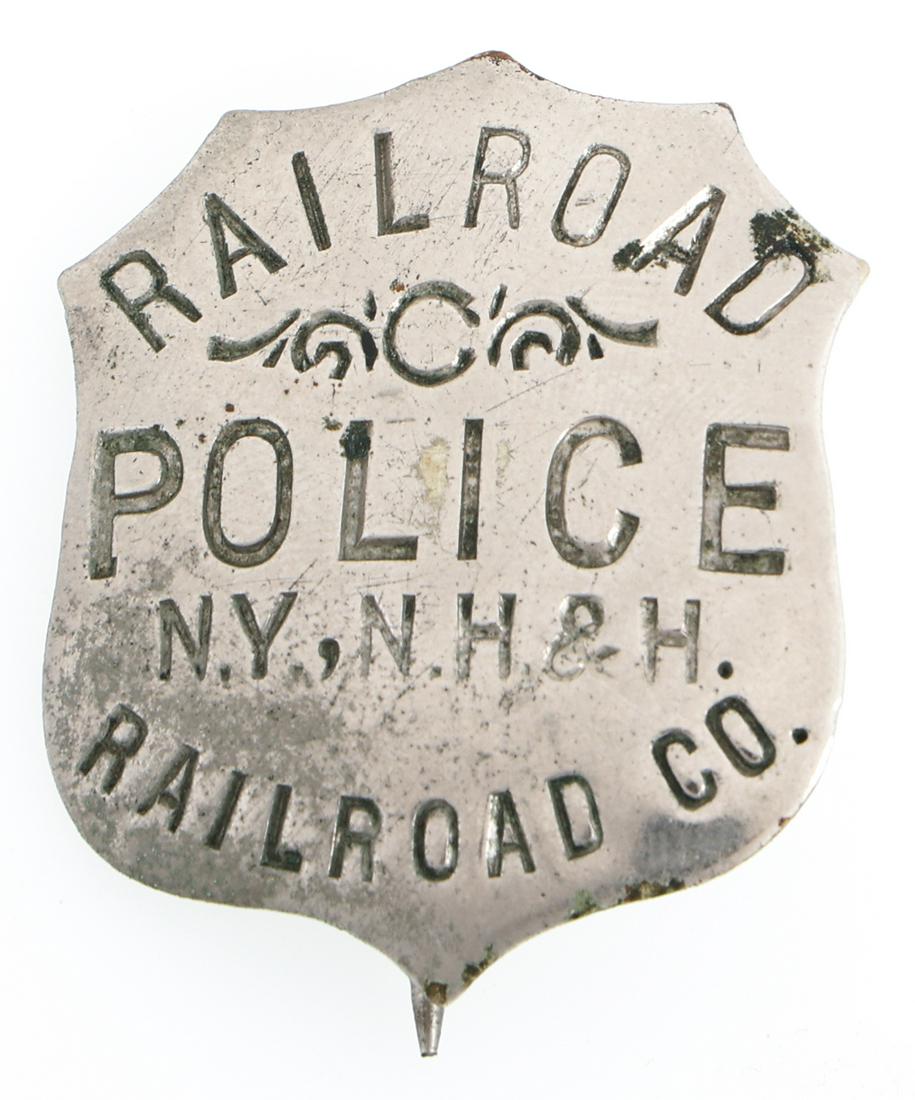 NEW YORK, NEW HAVEN & HARTFORD RAILROAD POLICE BADGE: NEW YORK, NEW HAVEN & HARTFORD RAILROAD POLICE BADGE Obsolete New York, New Haven and Hartford (NY, NH & H) Railroad Co. Police badge. Marked American Railway Supply Co. on reverse. 