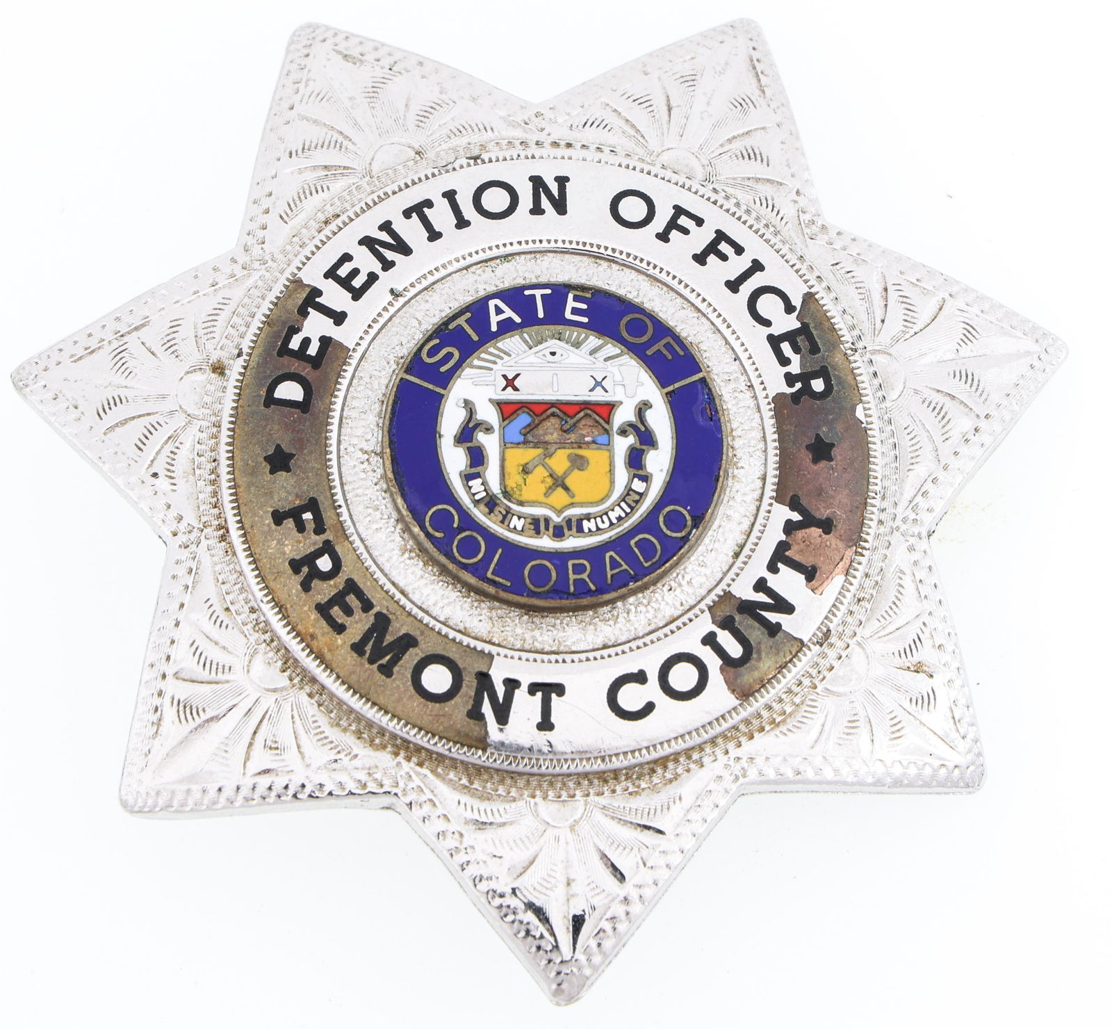 FREMONT COUNTY COLORADO DETENTION OFFICER BADGE: FREMONT COUNTY COLORADO DETENTION OFFICER BADGE Obsolete Fremont County, Colorado Detention Officer badge. Marked C.W. NIELSEN CHEHALIS WA on reverse. Measurements: 2.25 x 2.75"
