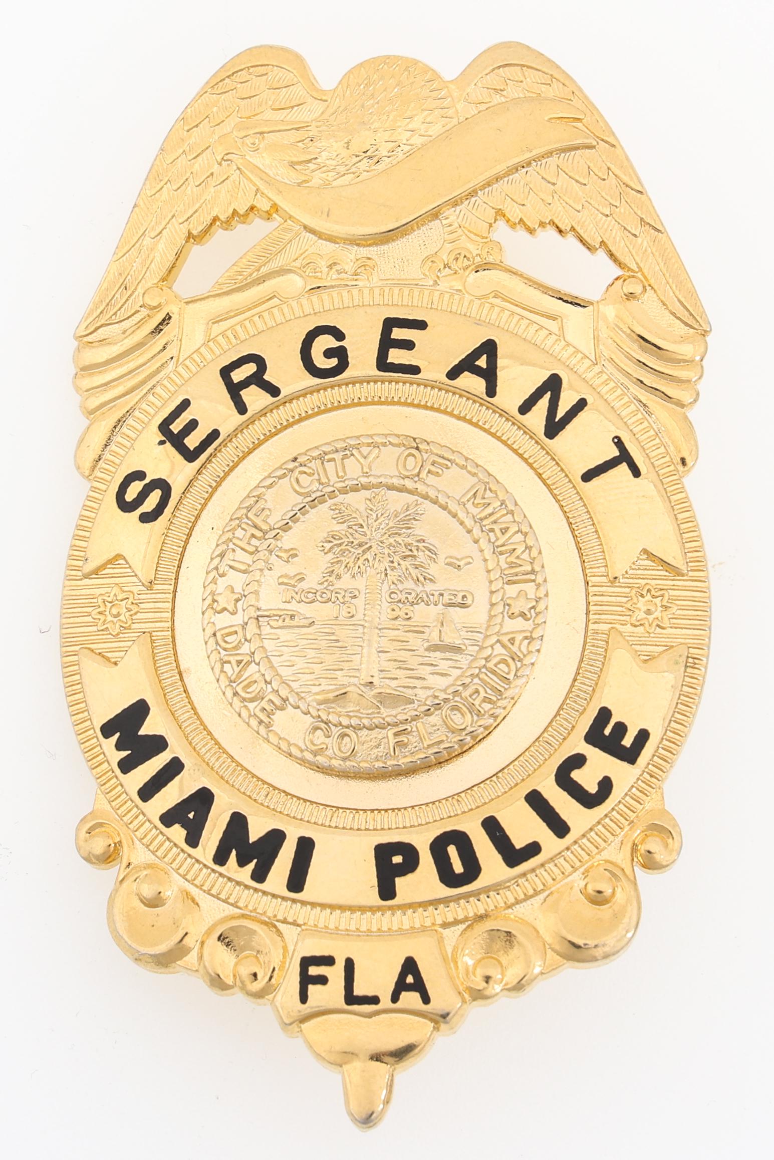MIAMI FLORIDA POLICE SERGEANT BADGE: MIAMI FLORIDA POLICE SERGEANT BADGE Obsolete Miami, Florida Police Sergeant badge, unmarked. Measurements: 1.75 x 2.75"