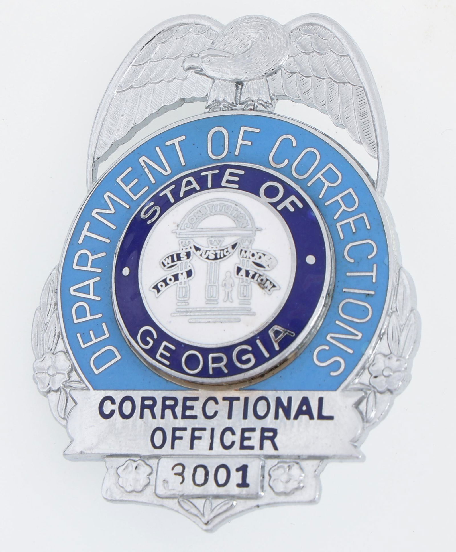 GEORGIA DEPARTMENT OF CORRECTIONS OFFICER BADGE: GEORGIA DEPARTMENT OF CORRECTIONS OFFICER BADGE Obsolete Georgia Department of Corrections Officer badge. Number 8001. Unmarked. Measurements: 1.5 x 2.25"
