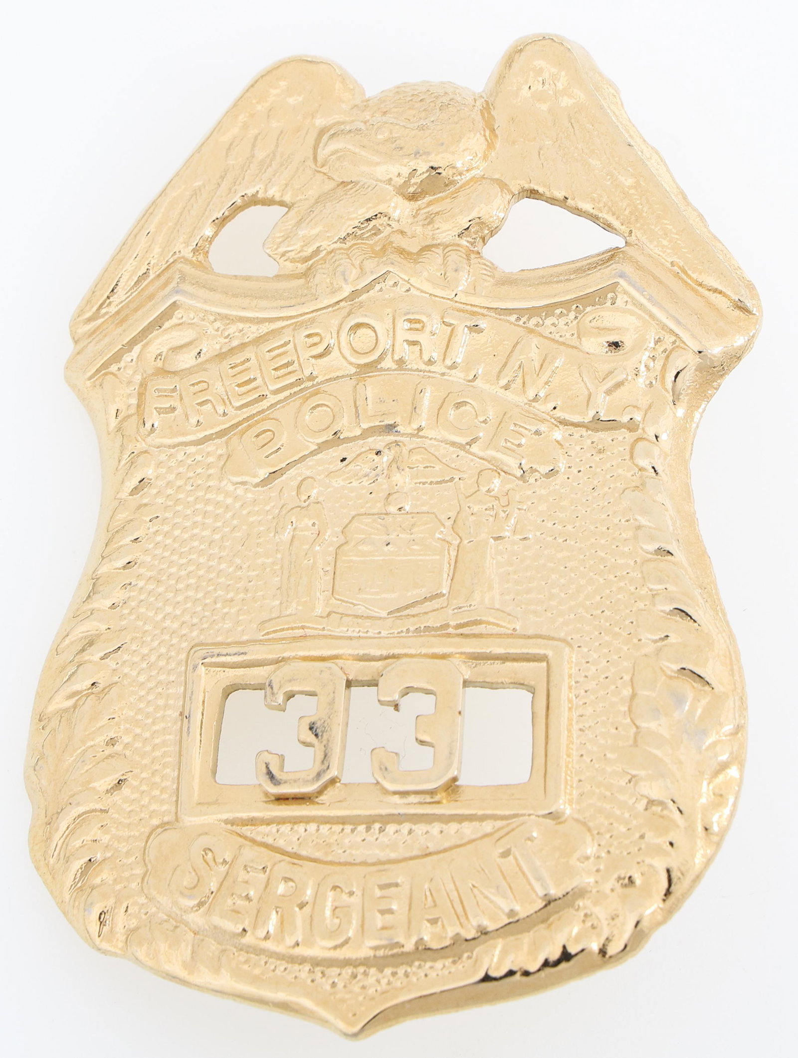 FREEPORT NY POLICE SERGEANT BADGE NO. 33: FREEPORT NY POLICE SERGEANT BADGE NO. 33 Obsolete Freeport, New York Police Sergeant badge. Numbered 33. Unmarked. Measurements: 3 x 2.5"