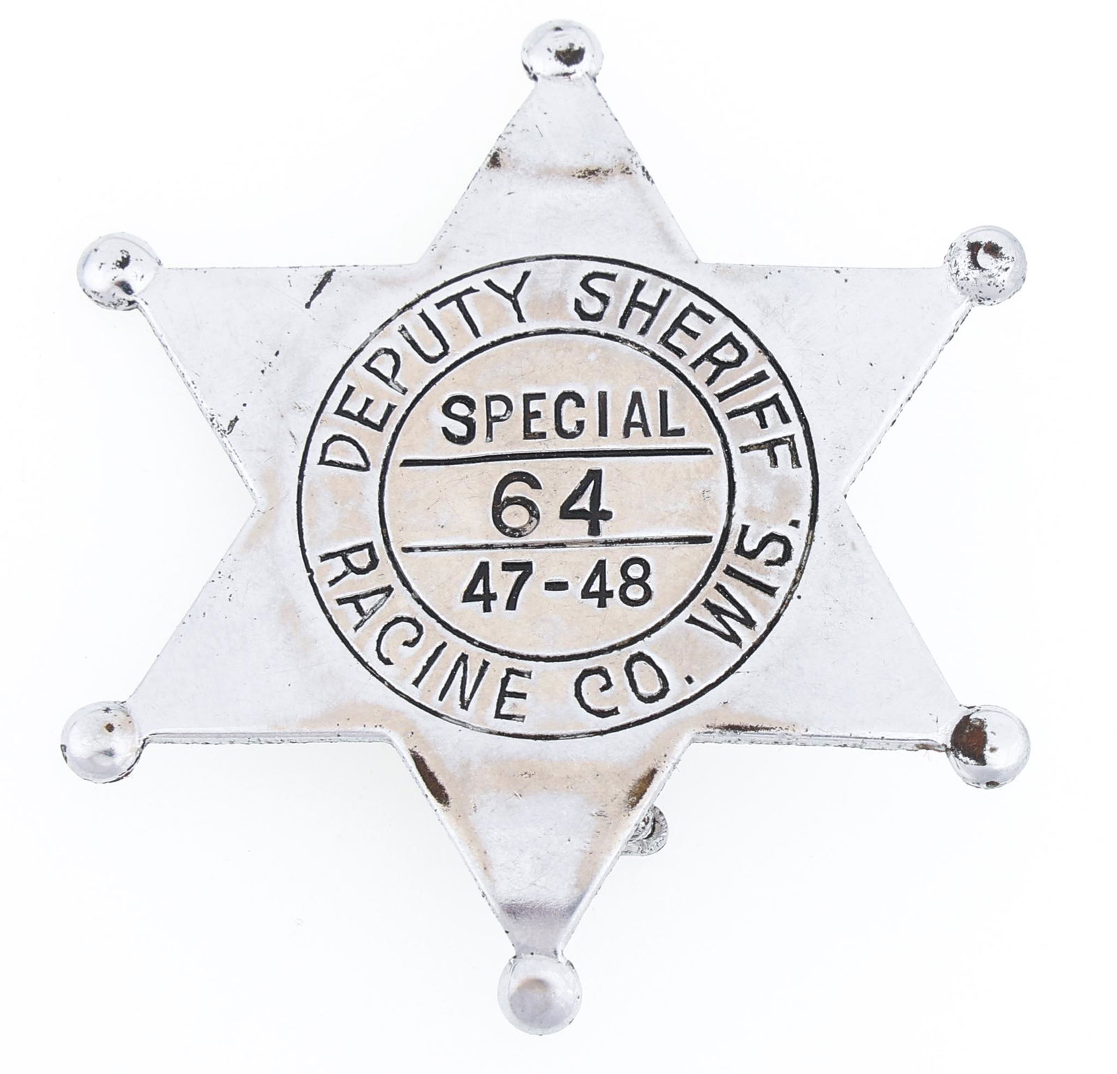 RACINE COUNTY WISCONSIN SPECIAL DEPUTY SHERIFF BADGE: RACINE COUNTY WISCONSIN SPECIAL DEPUTY SHERIFF BADGE Obsolete Racine County, Wisconsin Special Deputy Sheriff badge, dated 1947-48. Number 64. Marked PAT. 2066969 on reverse. Measurements: 1