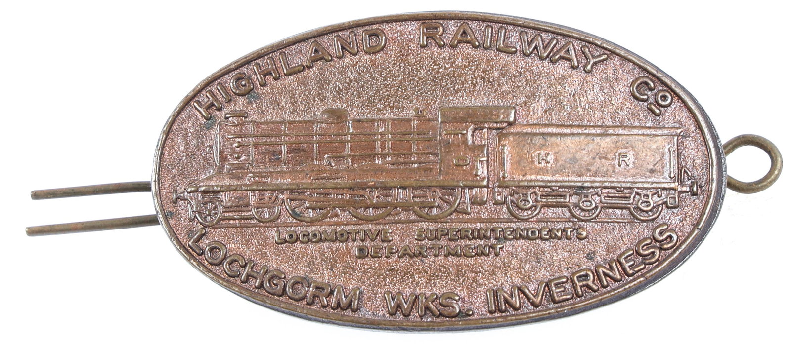 HIGHLAND RAILWAY CO LOCHGORM WKS INVERNESS BADGE: HIGHLAND RAILWAY CO LOCHGORM WKS INVERNESS BADGE Obsolete Highland Railway Co Lochgorm Works, Inverness Locomotive Superintendents Department badge. Unmarked Measurements: 2.5 x 1"