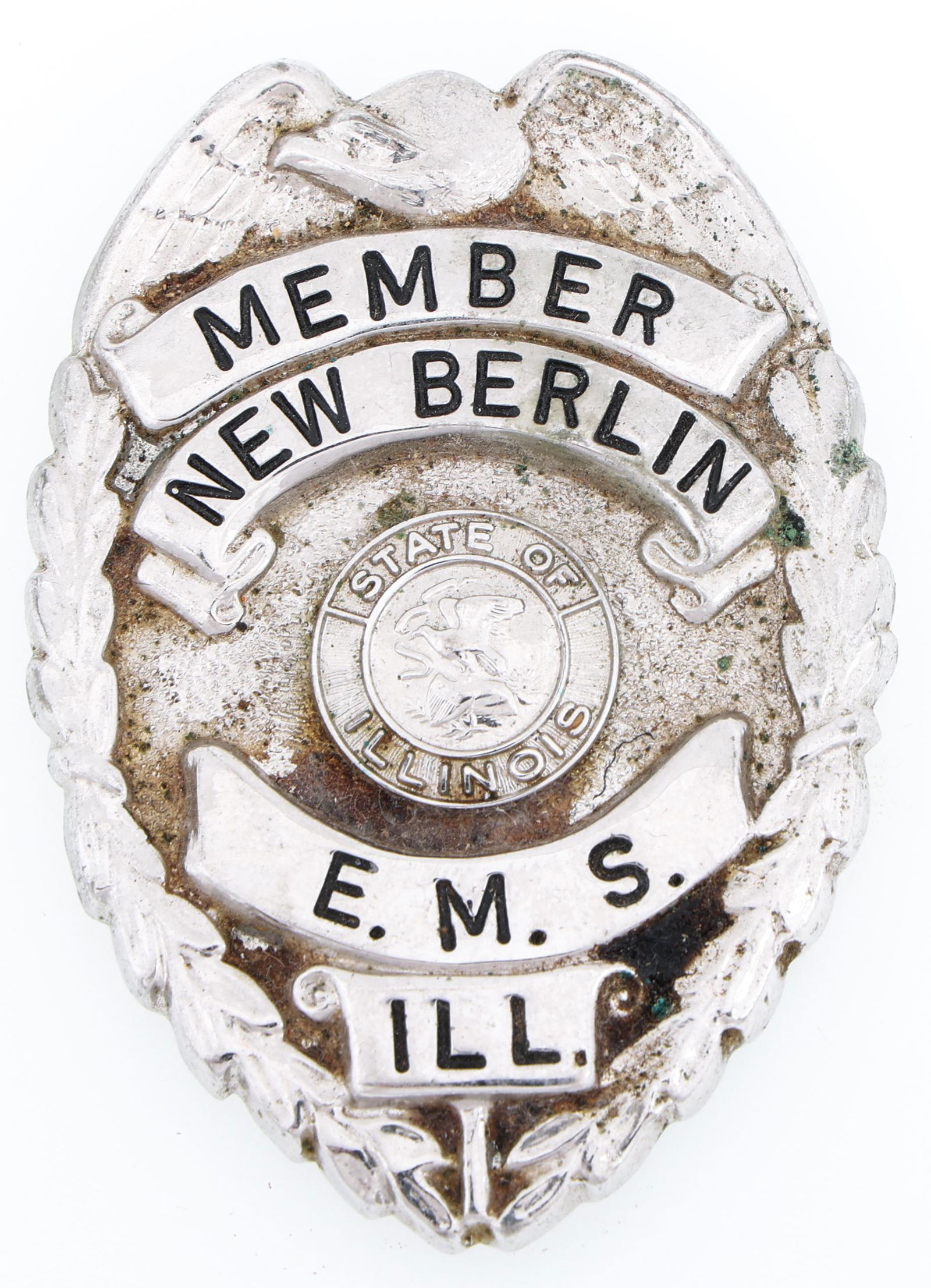 NEW BERLIN ILLINOIS E.M.S. MEMBER BADGE: NEW BERLIN ILLINOIS E.M.S. MEMBER BADGE Obsolete New Berlin, Illinois E.M.S. Member badge. Unmarked. Size: 1.75 x 2.5"