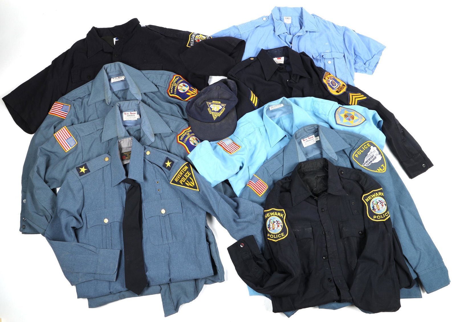 NEW JERSEY POLICE & LAW ENFORCEMENT UNIFORM SHIRTS: NEW JERSEY POLICE & LAW ENFORCEMENT UNIFORM SHIRTS Lot of nine mixed New Jersey Police and Law Enforcement uniform shirts and one hat, each with arm badge. Measurements: Varied