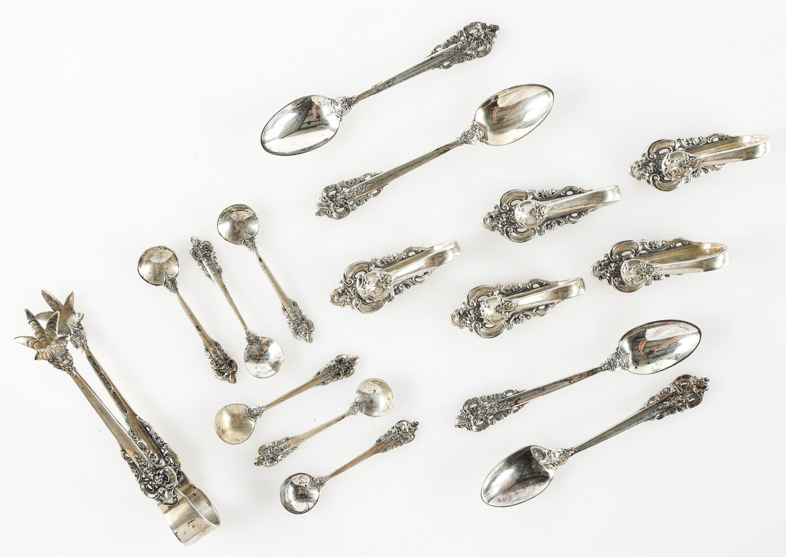 WALLACE STERLING SILVER GRANDE BAROQUE SERVEWARE: WALLACE STERLING SILVER GRANDE BAROQUE SERVEWARE Sterling silver Wallace serveware in the pattern Grande Baroque, includes: Sugar tongs, 4.5" (5) Napkin clips, 2" (6