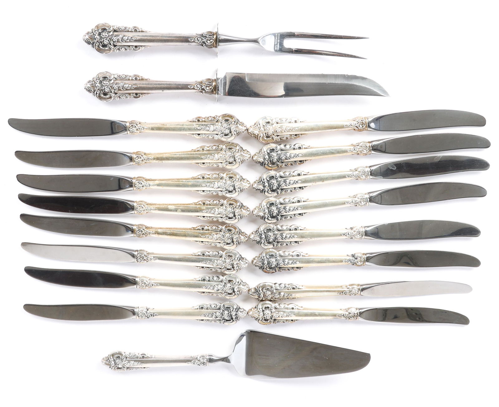 WALLACE STERLING GRANDE BAROQUE SERVEWARE: WALLACE STERLING GRANDE BAROQUE SERVEWARE Wallace Silver Co. sterling silver serveware in the pattern Grande Baroque, includes: Pie / Cake server, 10.5" Carving knife and fork set, 11"
