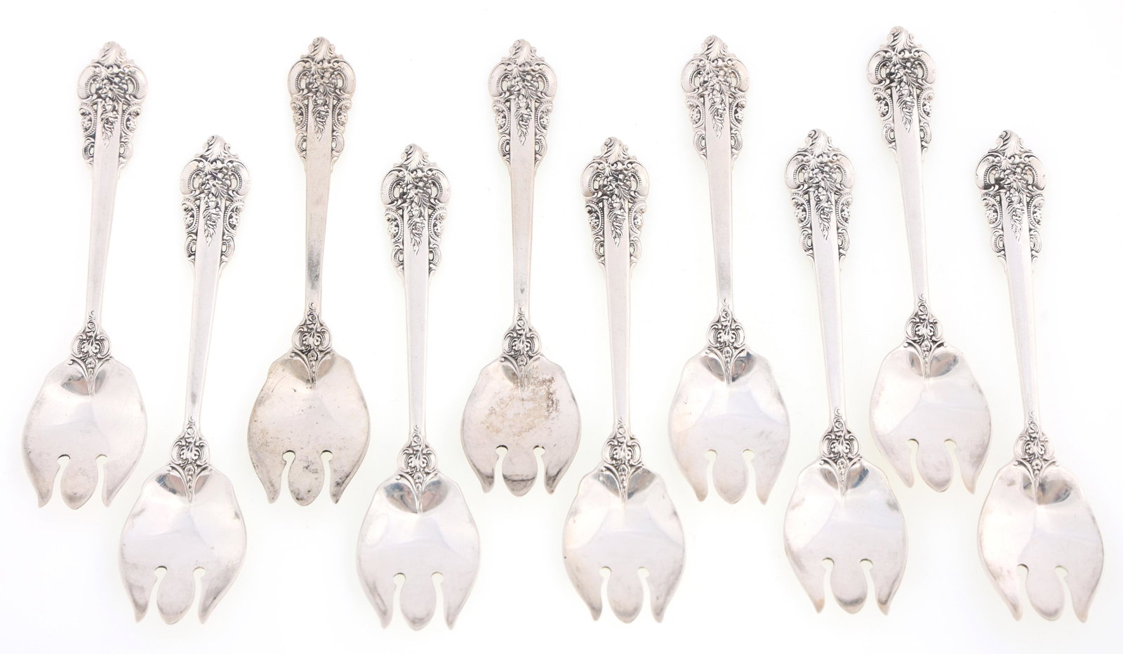 WALLACE STERLING SILVER GRANDE BAROQUE ICE CREAM FORKS: WALLACE STERLING SILVER GRANDE BAROQUE ICE CREAM FORKS Lot of ten sterling silver Wallace Grande Baroque pattern ice cream forks. Size: 5.25" Weight: 287.1g
