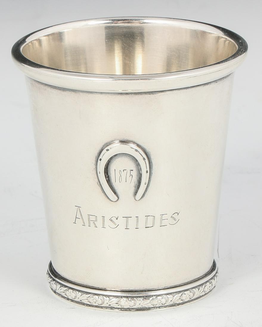 STERLING SILVER 1875 KENTUCKY DERBY JIGGER: STERLING SILVER 1875 KENTUCKY DERBY JIGGER Sterling silver Kentucky Derby 1875 jigger. Marked BWK on reverse. Engraved with "Aristides". Size: 2.25" Weight: 60g