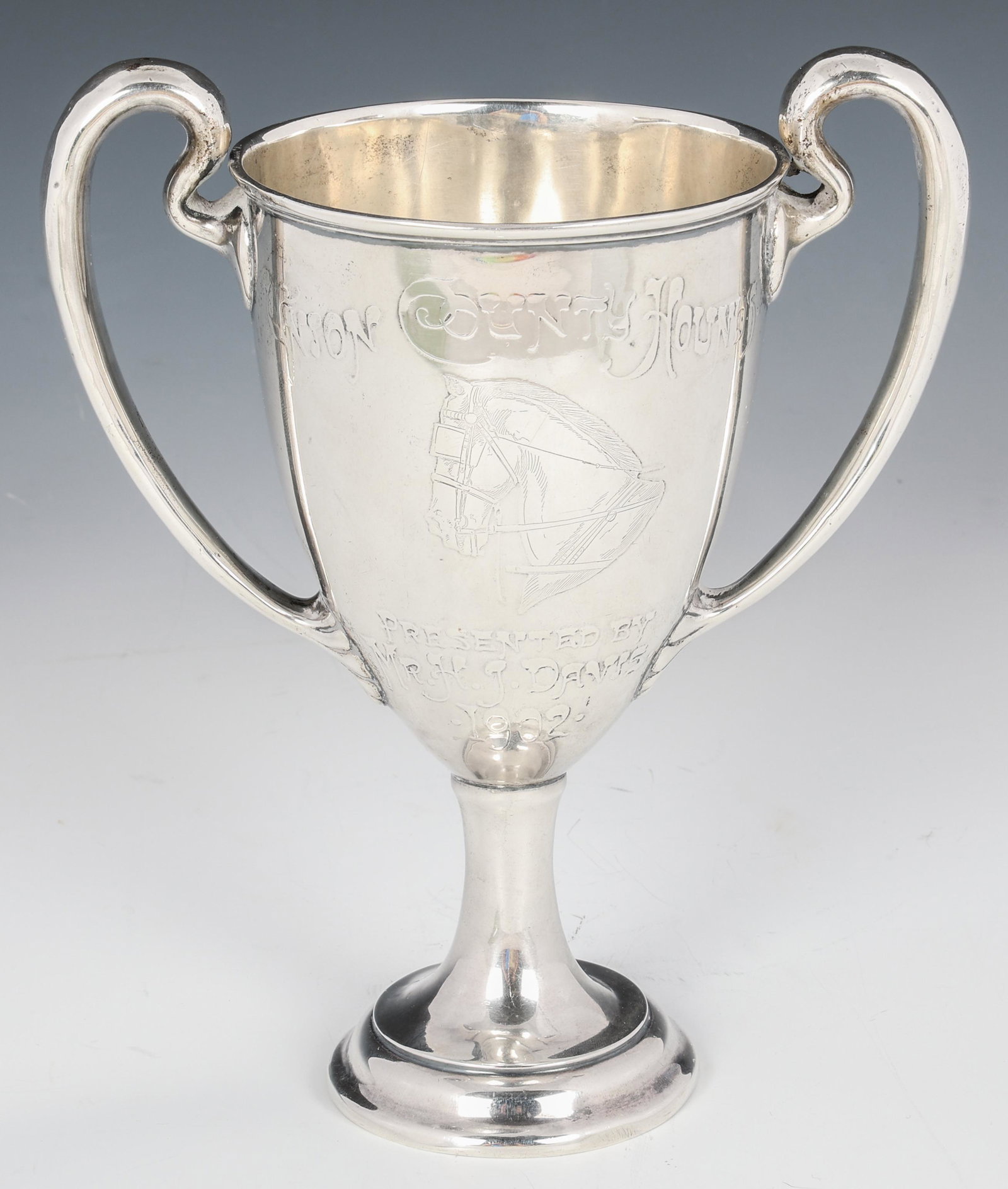 STERLING SILVER UNION COUNTY HORSE SHOW TROPHY CUP: STERLING SILVER UNION COUNTY HORSE SHOW TROPHY CUP Sterling silver Union County Hounds Horse Show Championship 1902 trophy cup. Won by "Golden ROD" and presented by "Mr. H. J. Davi