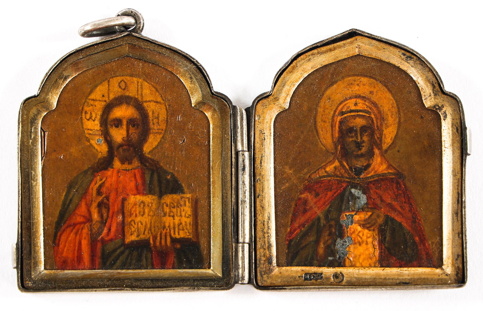 RUSSIAN ORTHODOX 84 SILVER MEDALLION ICON LOCKET: RUSSIAN ORTHODOX 84 SILVER MEDALLION ICON LOCKET Russian Orthodox 84 zolotnik (.875 fineness) silver medallion icon locket pendant, depicting printed images of Christ and Mother Mary. Marked inside an