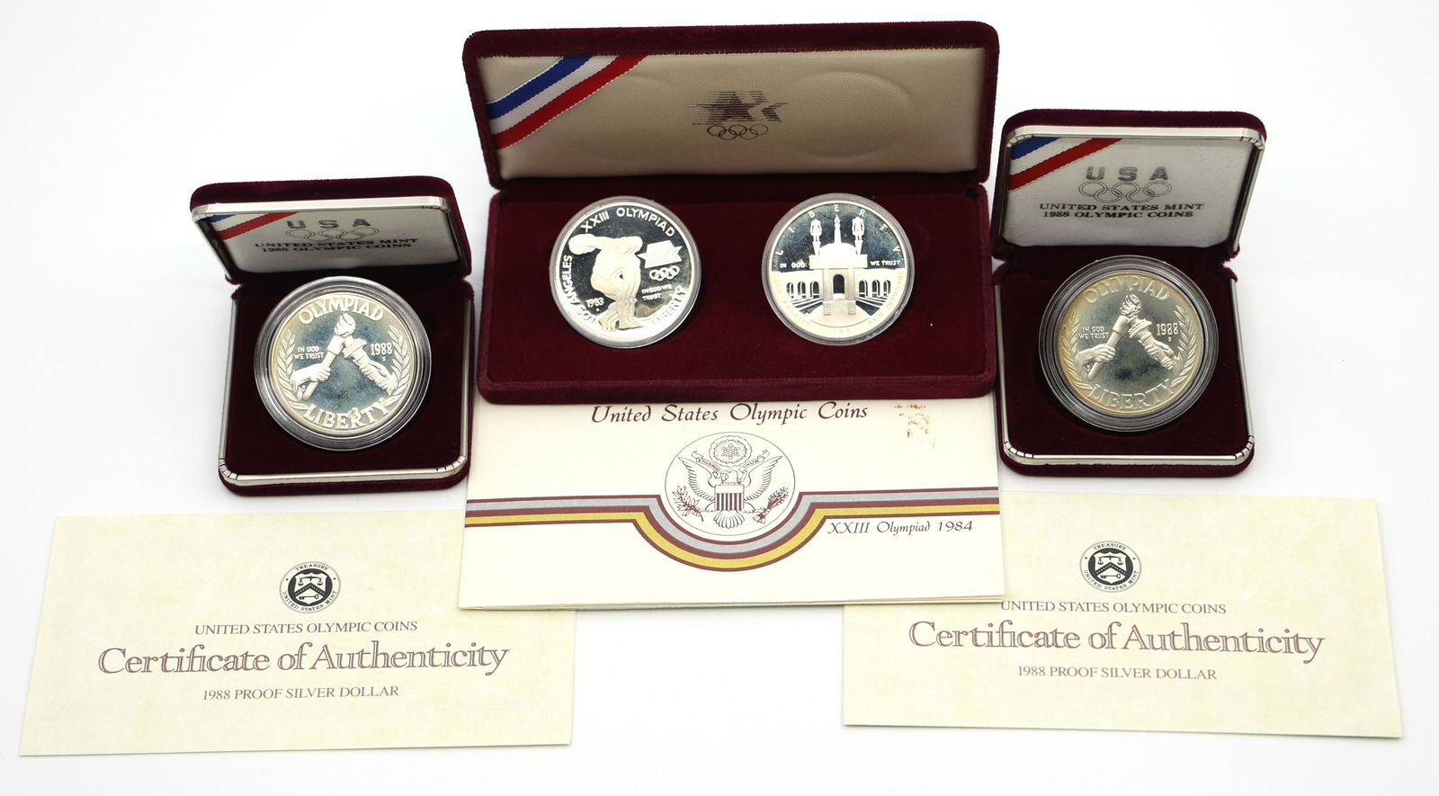 1980's US OLYMPIC GAMES COMMEMORATIVE SILVER COINS (1 of 4)