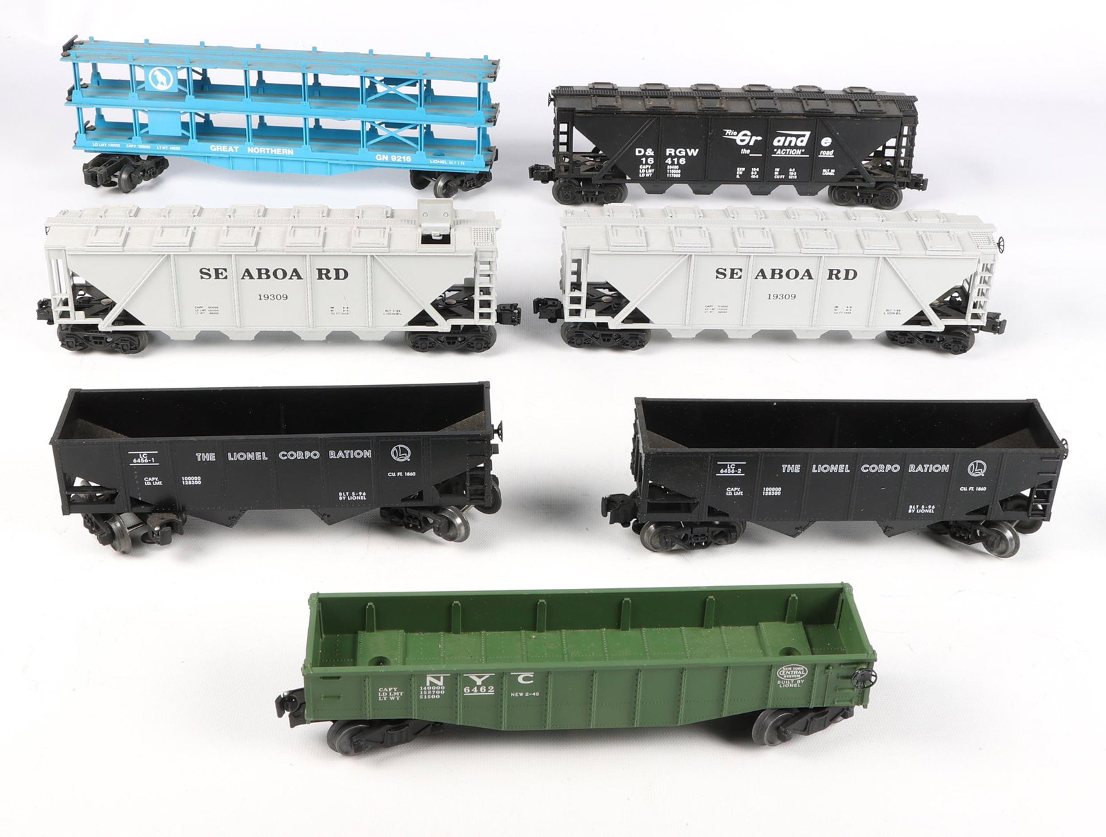 LIONEL O GAUGE MODEL TRAIN CAR - LOT OF 7: LIONEL O GAUGE MODEL TRAIN CAR - LOT OF 7 Lionel O-Gauge model train car - lot of 7, includes: (2) The Lionel Corporation hopper (2) Seaboard covered hopper, 19309 D & RGW covered hop