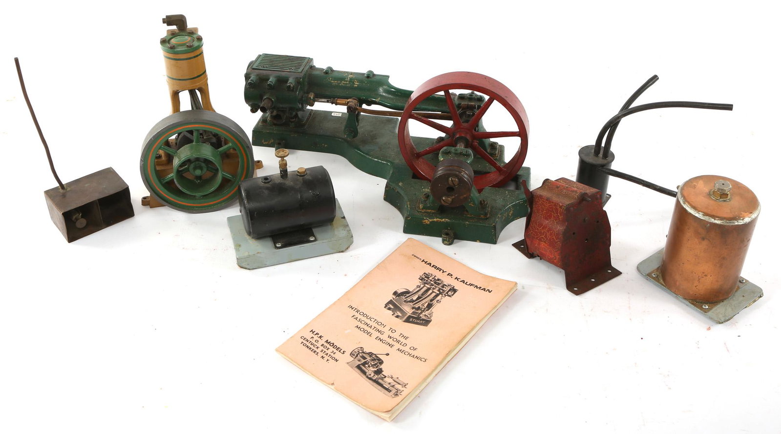 METAL MACHINE MODELS - LOT OF 7: METAL MACHINE MODELS - LOT OF 7 Group of seven metal machine models from the early to mid 20th century. Models not tested for functionality. Includes: Single Piston Model Steam Engine Refilla