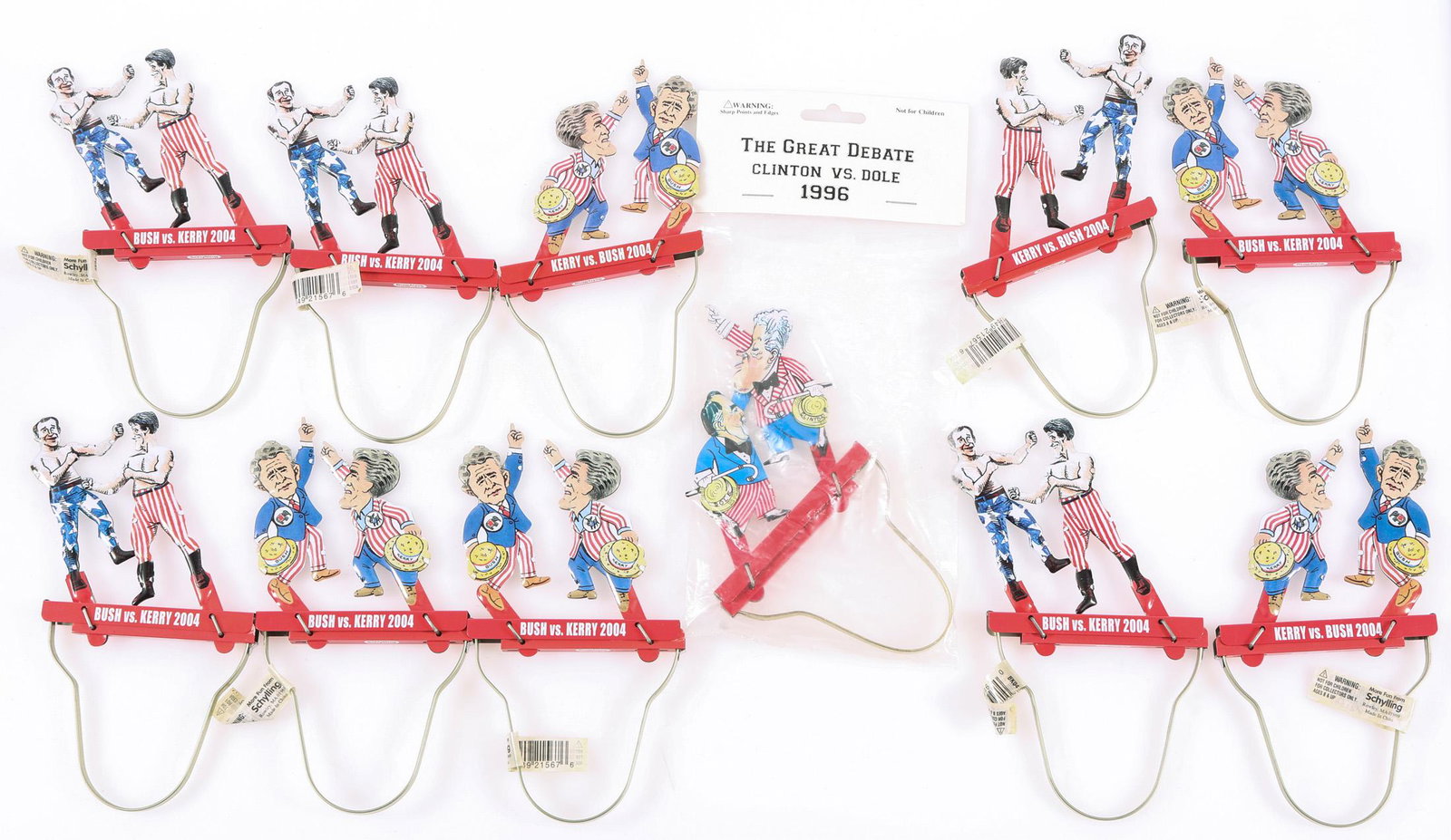SCHYLLING POLITICAL TIN PUPPETS - LOT OF 11: SCHYLLING POLITICAL TIN PUPPETS - LOT OF 11 Lot of 11 Schylling political tin puppets, to include (10) 2004 Bush vs. Kerry in two varieties and (1) 1996 Clinton vs. Dole.