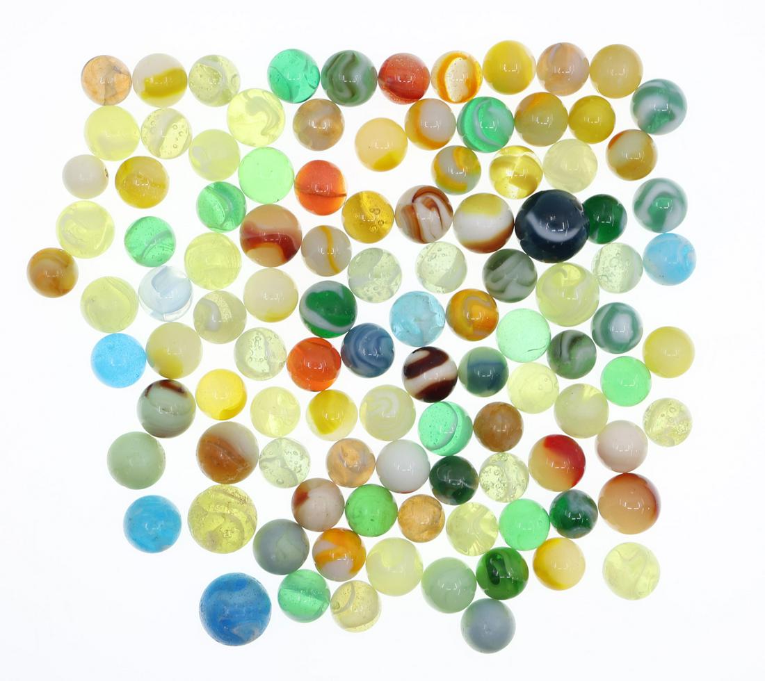 EARLY 20th C. GLASS MARBLES - SLAG, UV, CLEARIES & MORE: EARLY 20th C. GLASS MARBLES - SLAG, UV, CLEARIES & MORE 100+ glass marbles including slag, UV reactive, clearies, and more. Early 20th century.