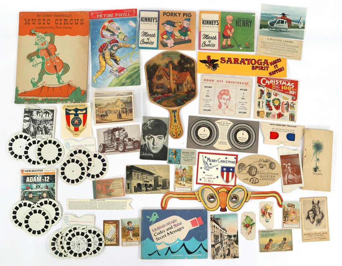 SOUVENIR PAPER EPHEMERA: SOUVENIR PAPER EPHEMERA Souvenir paper ephemera, including: 20 piece puzzle Christmas seals Sears paper fan Paper glasses Kinney Shoe Store comics Postcards <