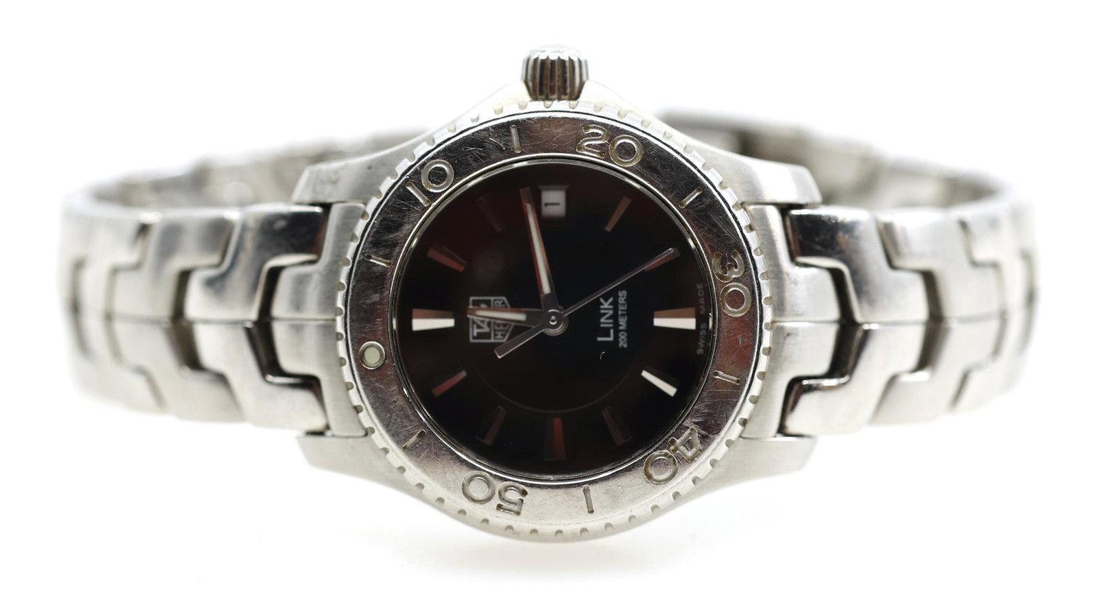 LADIES TAG HEUER LINK WJ1314 STAINLESS STEEL WRISTWATCH: LADIES TAG HEUER LINK WJ1314 STAINLESS STEEL WRISTWATCH Ladies Tag Heuer Link WJ1314 stainless steel wristwatch: Baton markers Date window Serial #: LN7733