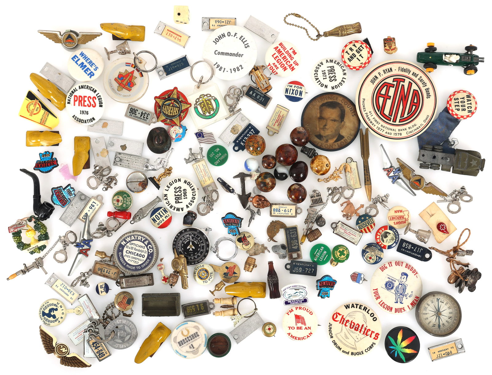 NOVELTY ITEMS MINIATURES POLITICAL BUTTONS & MORE: NOVELTY ITEMS MINIATURES POLITICAL BUTTONS & MORE Mixed novelty items including miniatures, toys, political buttons, key chains, ceramic marbles, and more.