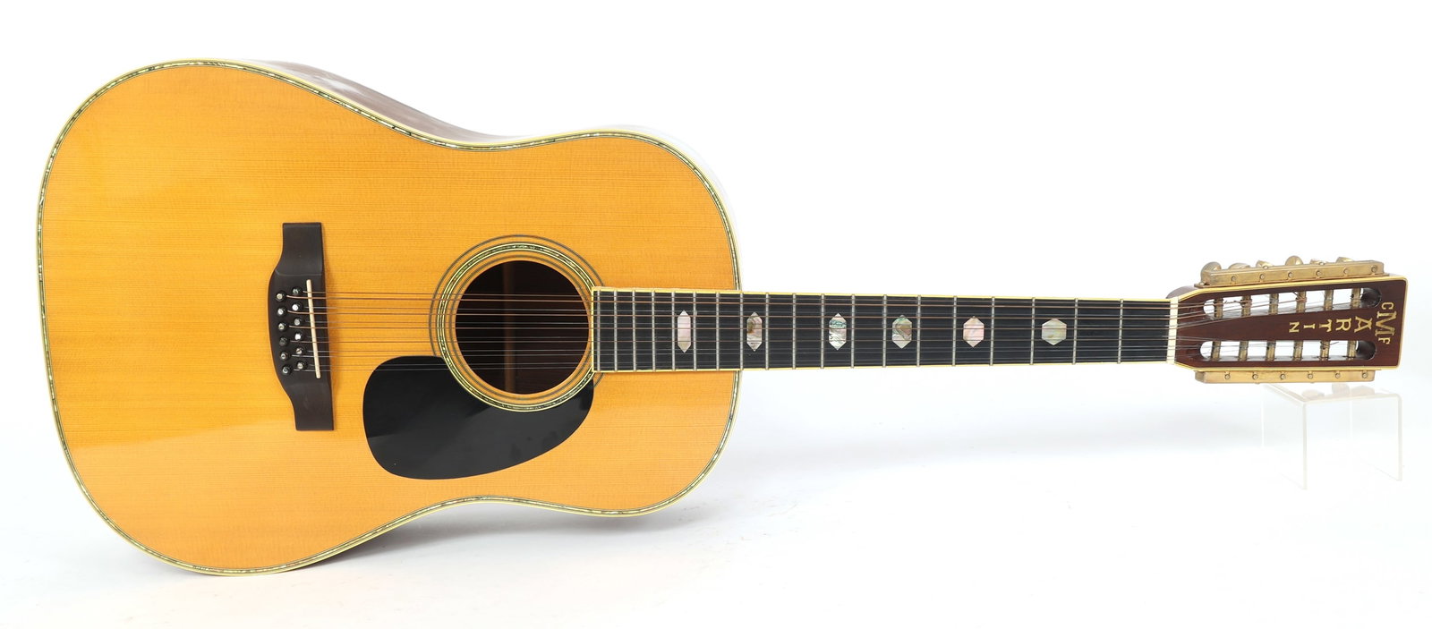 1971 C.F. MARTIN D12-41 12-STRING ACOUSTIC GUITAR: 1971 C.F. MARTIN D12-41 12-STRING ACOUSTIC GUITAR 1971 C.F. Martin D12-41 12-string acoustic guitar. Serial #: 273067 Refurbished in 1994 by Teigen Guitars. Service included: