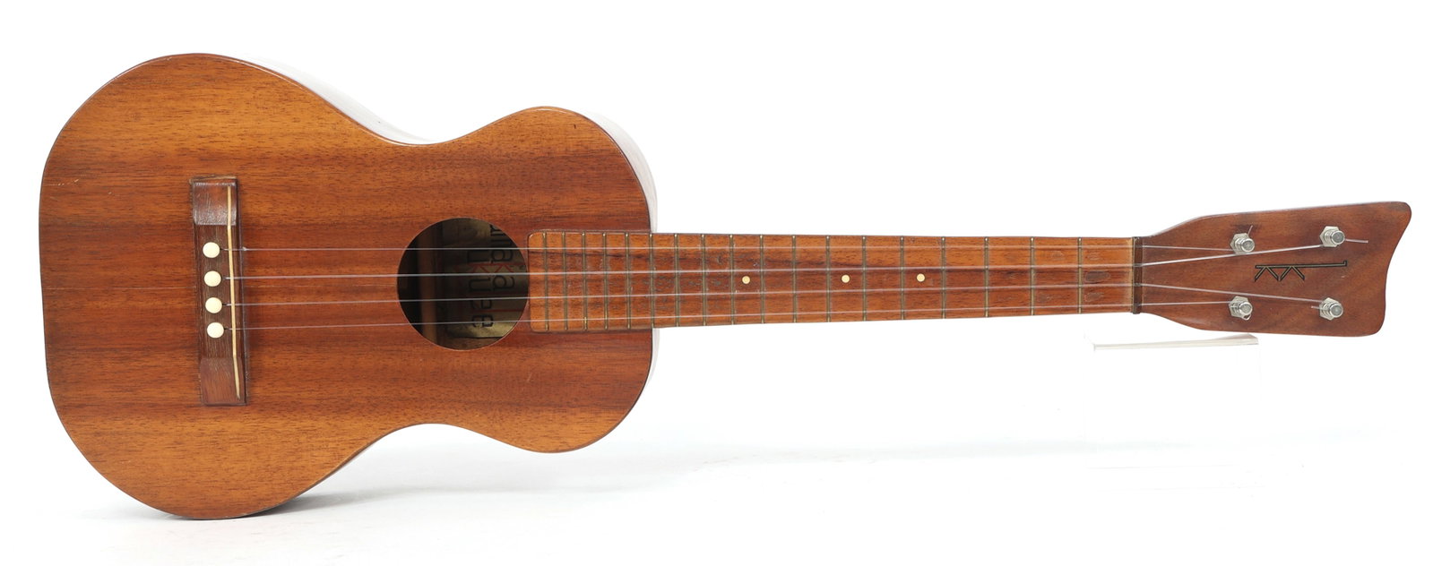 MID-20TH C KAMAKA 4-STRING TENOR UKULELE MADE IN HAWAII: MID-20TH C KAMAKA 4-STRING TENOR UKULELE MADE IN HAWAII Mid-20th century Kamaka 4-string tenor ukulele, made in Hawaii.