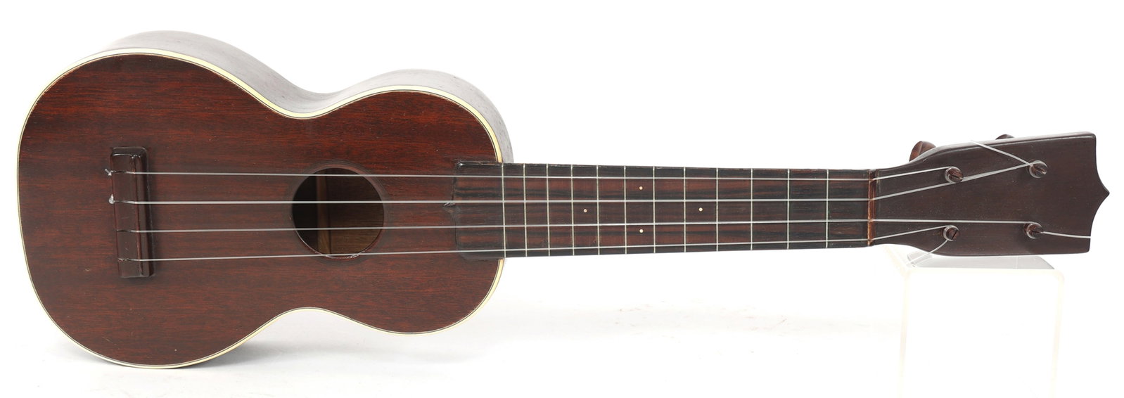 EARLY 20TH C. C.F. MARTIN SOPRANO STYLE 0 UKULELE: EARLY 20TH C. C.F. MARTIN SOPRANO STYLE 0 UKULELE Early 20th-century C.F. Martin Soprano Style 0 ukulele. No serial number. Stamped to the interior and back of the headstock. Includes hardsh