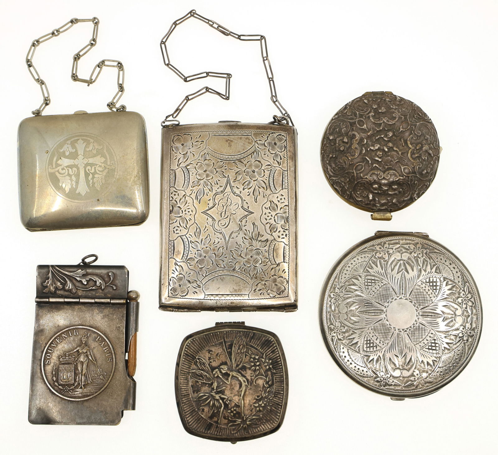 SILVERPLATED COMPACTS, PURSES, & POCKET ITEMS: SILVERPLATED COMPACTS, PURSES, & POCKET ITEMS Silverplated compacts, purses, pill box, and pocket notepad case. Period: 20th C. Weight: 371g