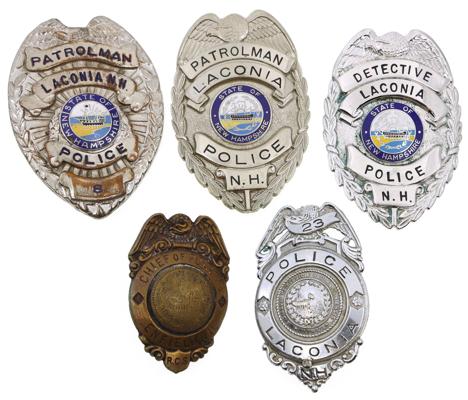 NEW HAMPSHIRE OBSOLETE LAW ENFORCEMENT POLICE BADGES: NEW HAMPSHIRE OBSOLETE LAW ENFORCEMENT POLICE BADGES Five obsolete New Hampshire law enforcement and police badges, including: Laconia Police Patrolman Laconia Police Detective Laconia Pol