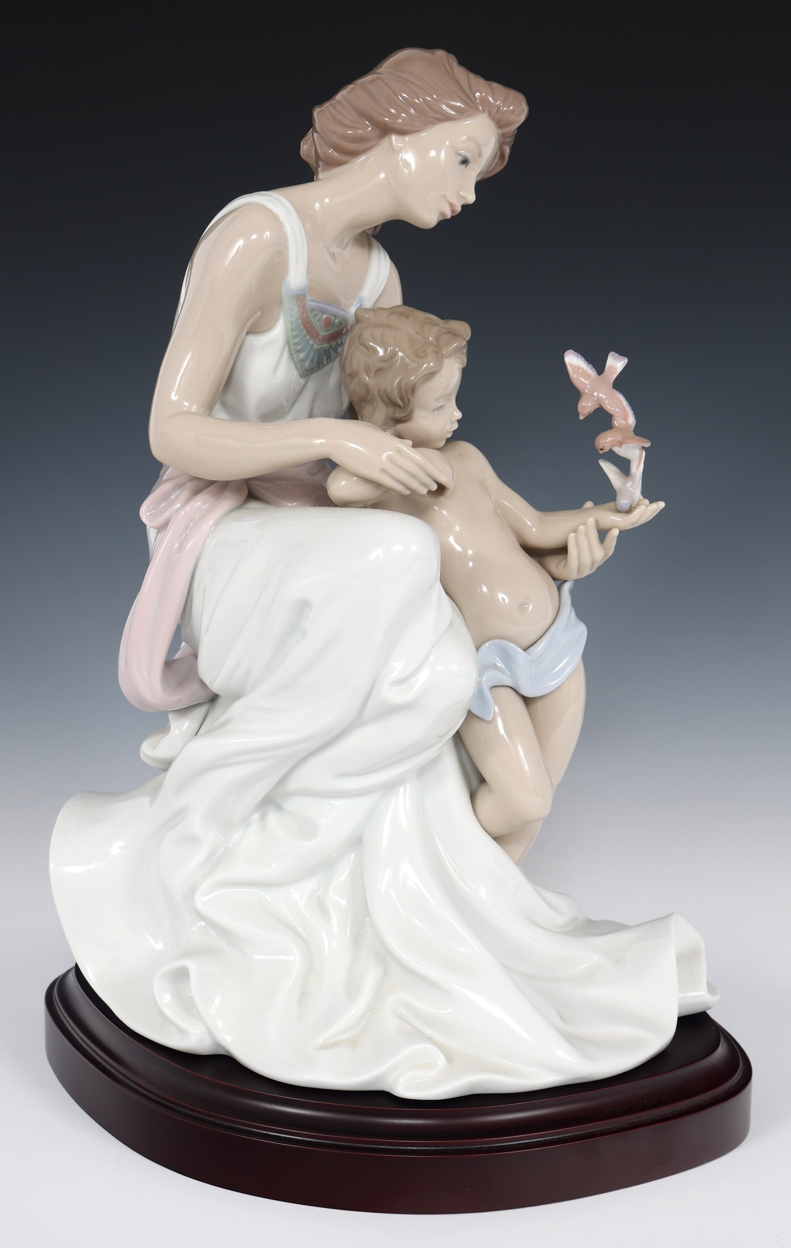 LLADRO WHERE LOVE BEGINS PORCELAIN FIGURINE 7649: LLADRO WHERE LOVE BEGINS PORCELAIN FIGURINE 7649 Lladro porcelain 7649 Where Love Begins figurine. Includes box, base, and framed certificate. Signed by the sculptor to the underside. Size: