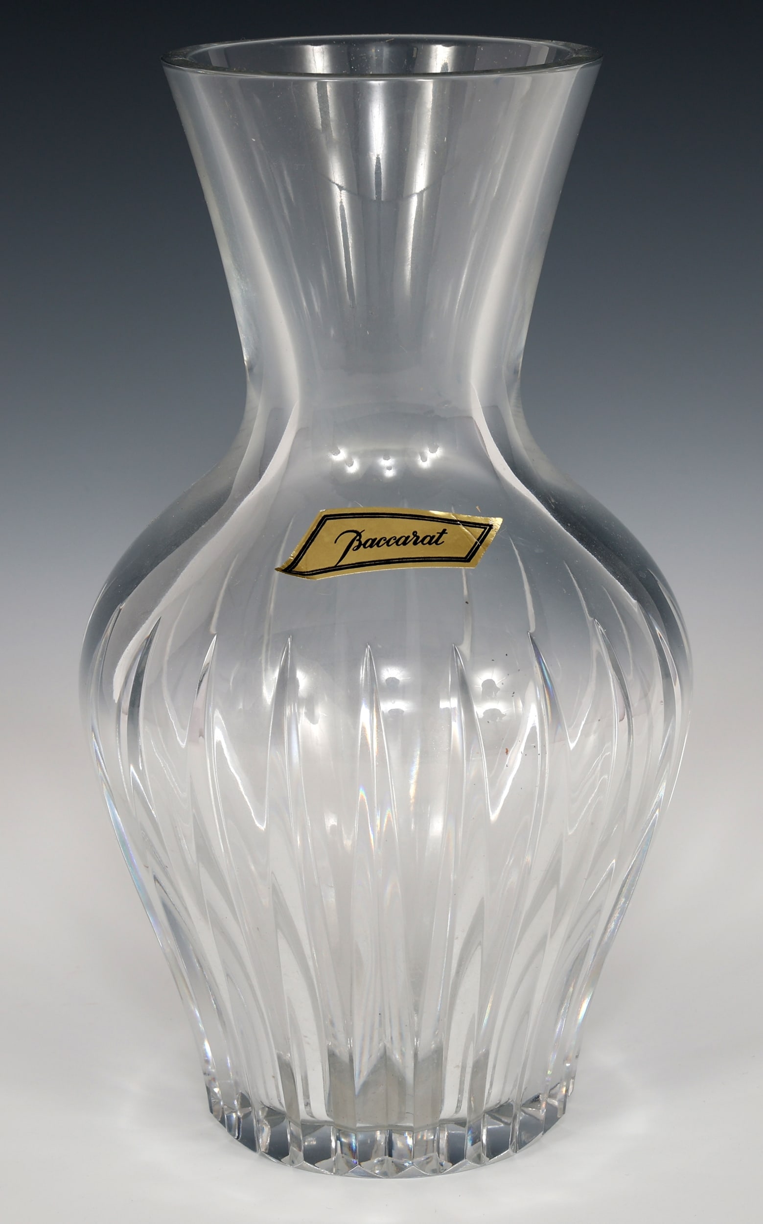 BACCARAT CRYSTAL FLOWER VASE: BACCARAT CRYSTAL FLOWER VASE Baccarat Crystal flower vase. Marked on underside. Size: 10"