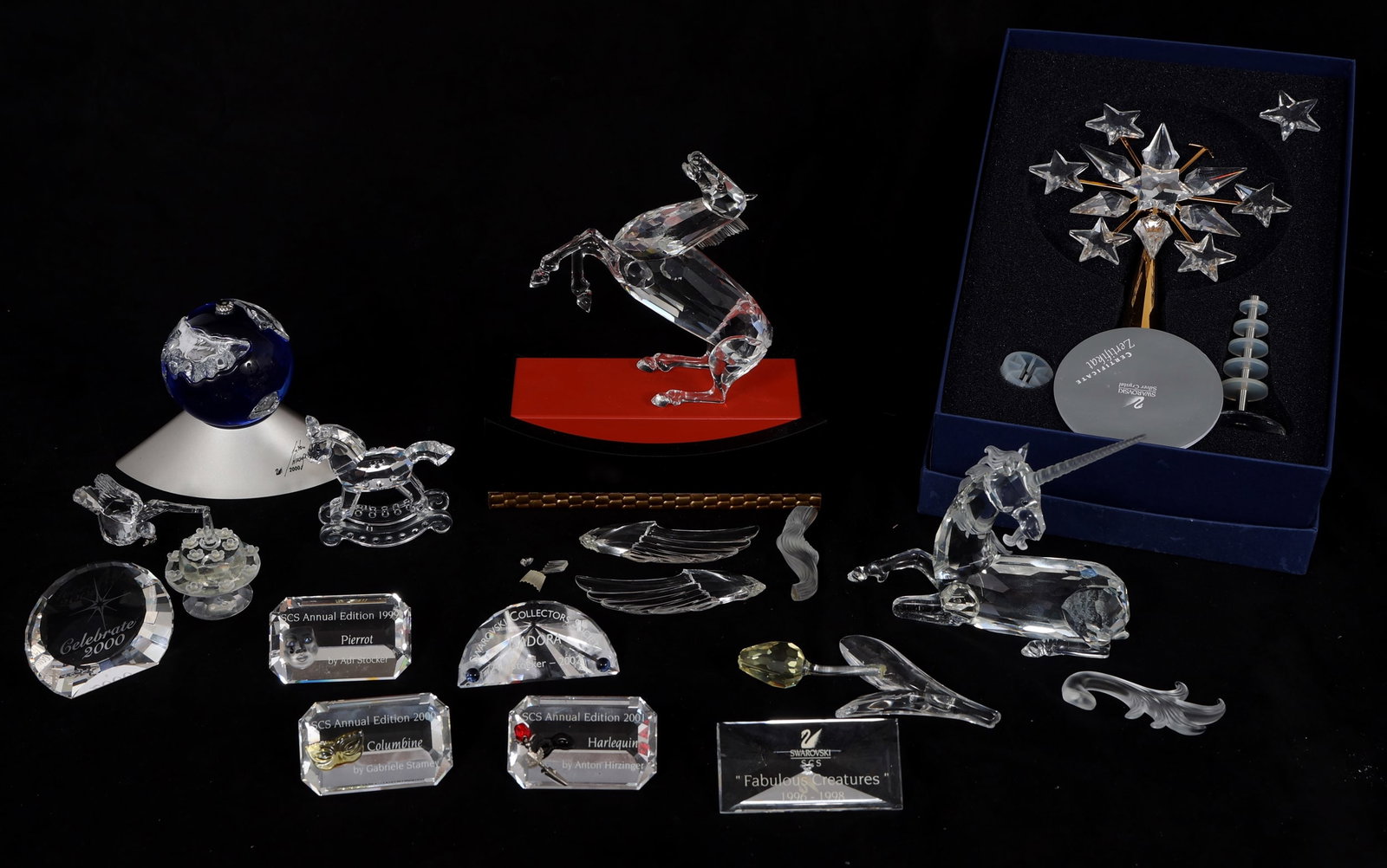 SWAROVSKI CRYSTAL FIGURINES, PLAQUES, & MORE: SWAROVSKI CRYSTAL FIGURINES, PLAQUES, & MORE Swarovski crystal figurines plaques and more, including: Pegasus figurine (for repair), and collectors Pegasus stand Unicorn figurine