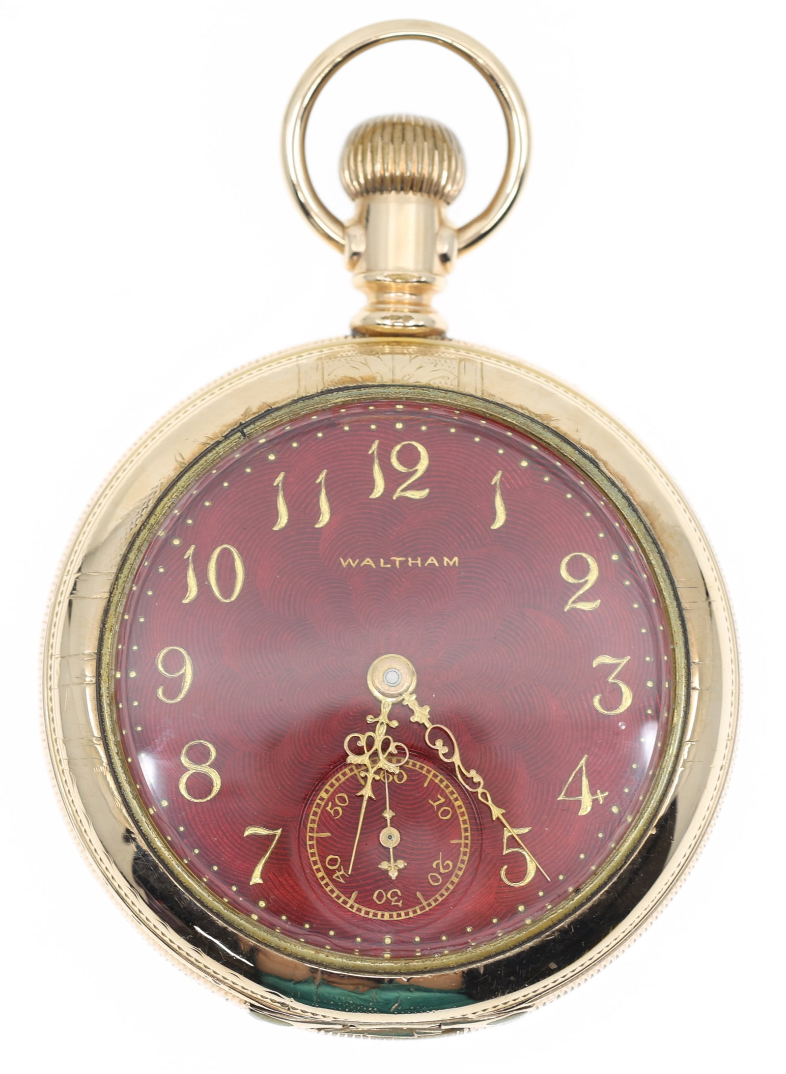 MEN'S WALTHAM GOLD-FILLED CASE POCKET WATCH: MEN'S WALTHAM GOLD-FILLED CASE POCKET WATCH Men's Waltham gold-filled case pocket watch: Open face Arabic numerals on a red enamel face Movement/Serial #: 6560933 15 jew