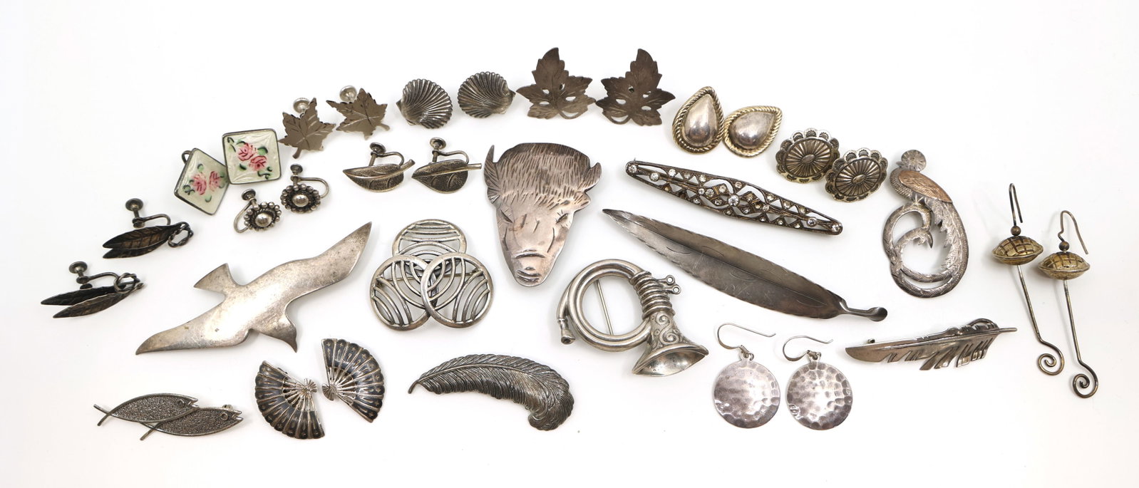 STERLING SILVER FASHION EARRINGS & BROOCHES: STERLING SILVER FASHION EARRINGS & BROOCHES Sterling silver fashion jewelry: Earrings Abstract Nature-inspired Pierced and clip-on Brooches/pins