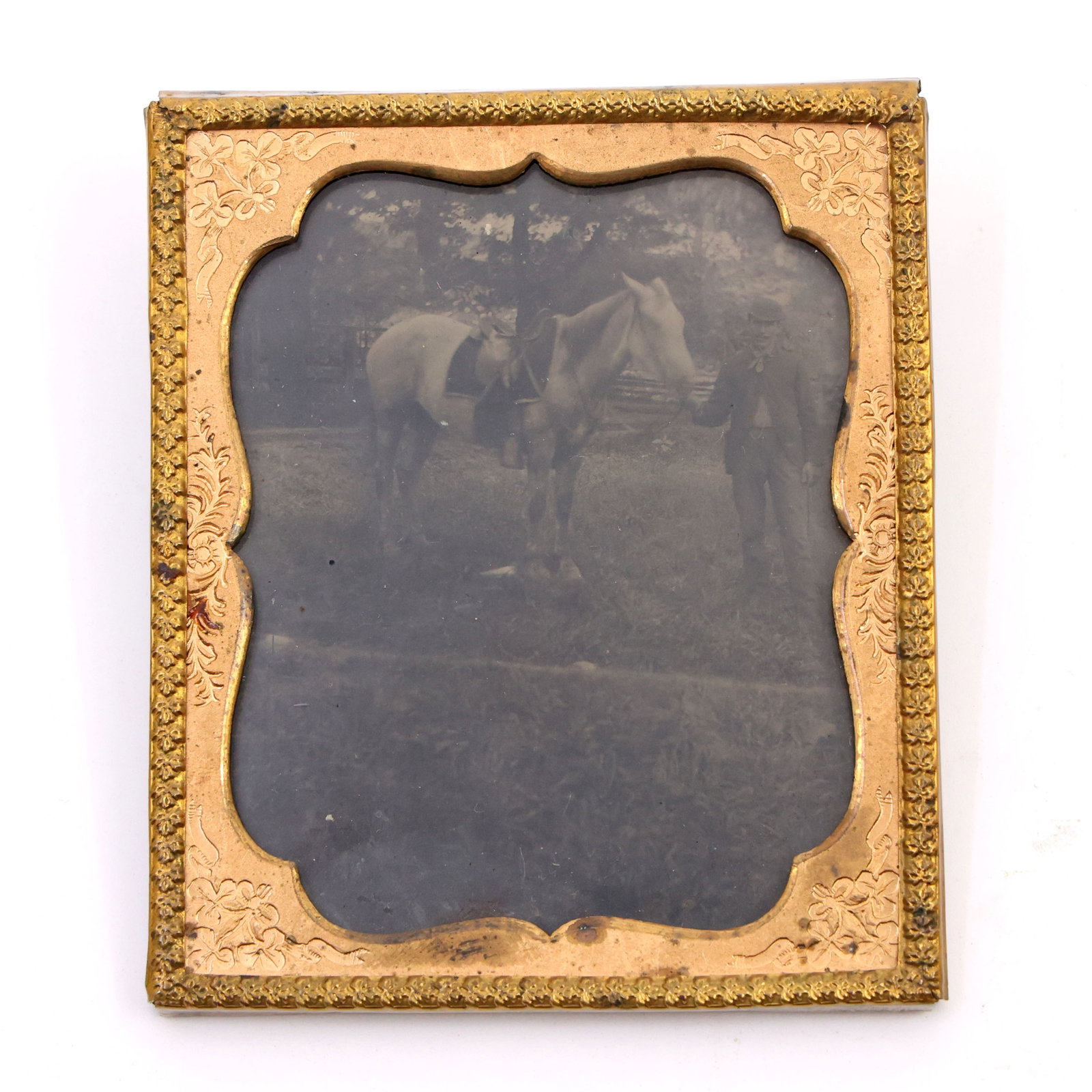 TINTYPE OF HORSE & MAN: TINTYPE OF HORSE & MAN Tintype image of horse & man under glass. Size - Framed: 2.75" x 3.25" Size - Viewable: 2" x 2.5"