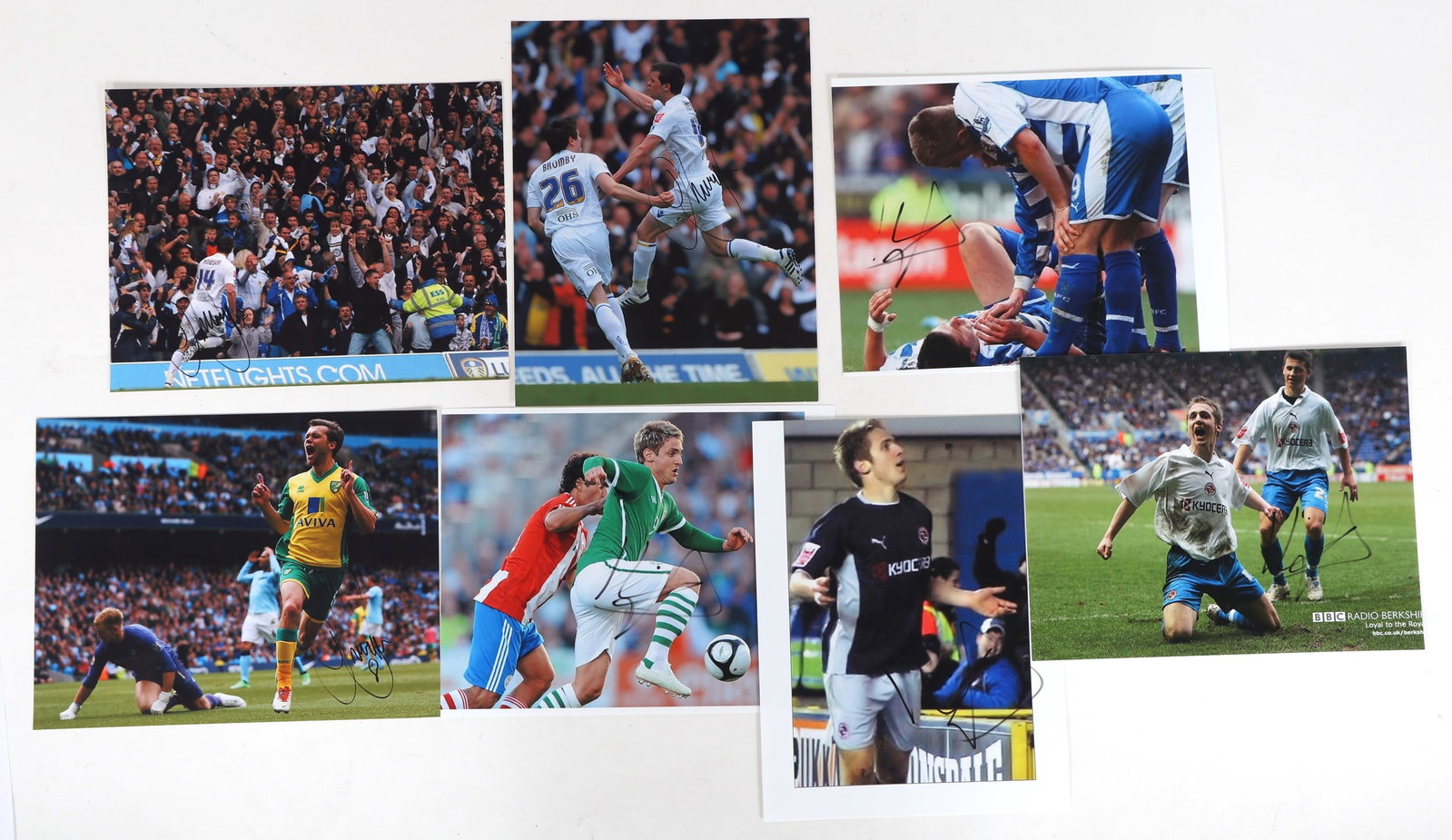 SOCCER AUTOGRAPHS - DOYLE & HOWSON: SOCCER AUTOGRAPHS - DOYLE & HOWSON Seven soccer autographs, including: (4) Kevin Doyle 8.5 x 11" photo print signed in black marker (3) Jonny Howson 8.5 x 11" print signed i