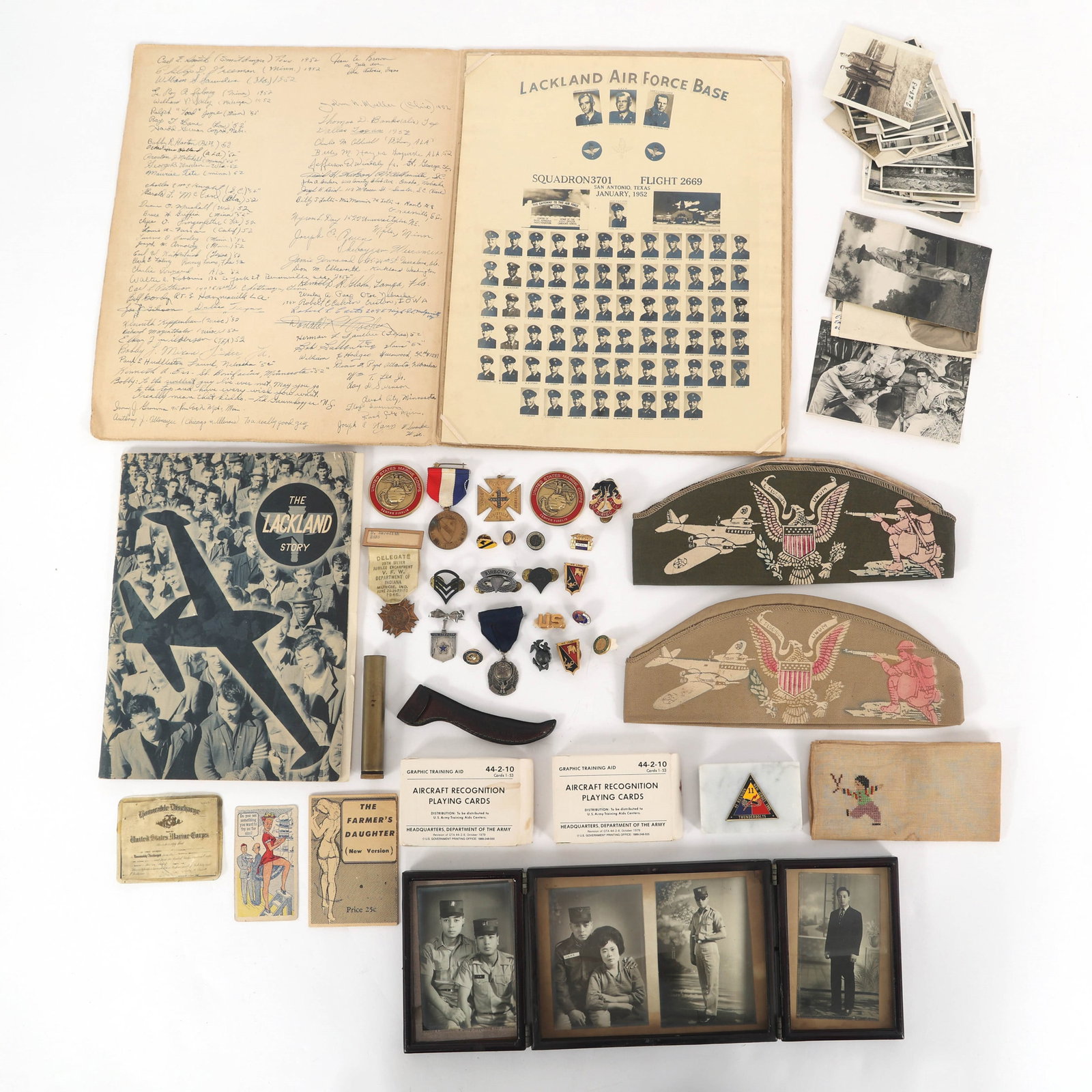 MILITARY COLLECTIBLES AND EPHEMERA: MILITARY COLLECTIBLES AND EPHEMERA (38) Military collectibles and ephemera: (4) Framed Korean family portraits (15" x 5") Cross-stiched handkerchief (11.5" x 11.5") (2) Aircraft recognition play