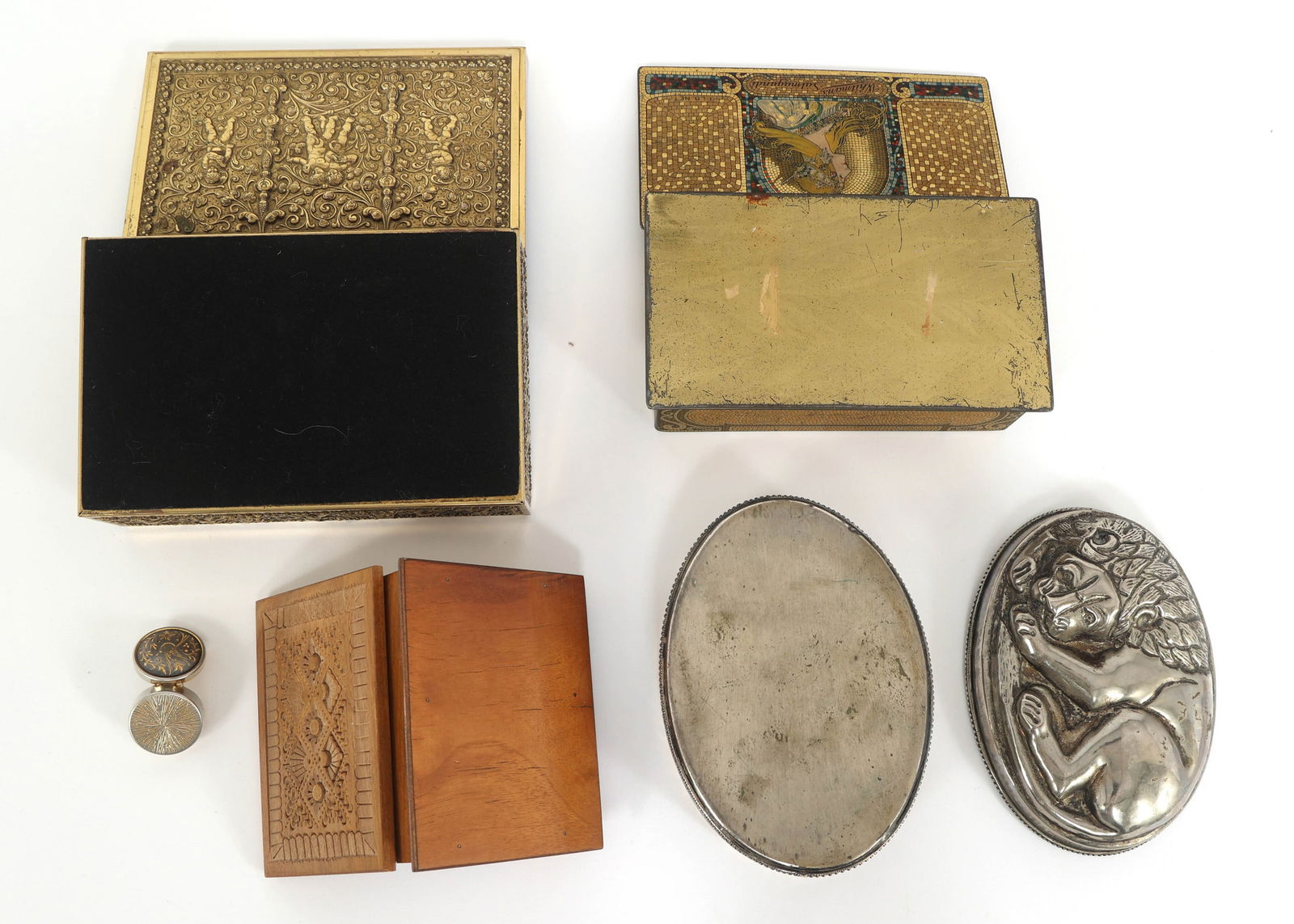 20TH C. DECORATIVE BOXES: 20TH C. DECORATIVE BOXES (5) 20th century decorative boxes. Silver-plated pill box, 1" Wooden box with carved lid, 4.75" x 3.5" Oval silver-plated lion box, 6.5" x 4.5" Whit