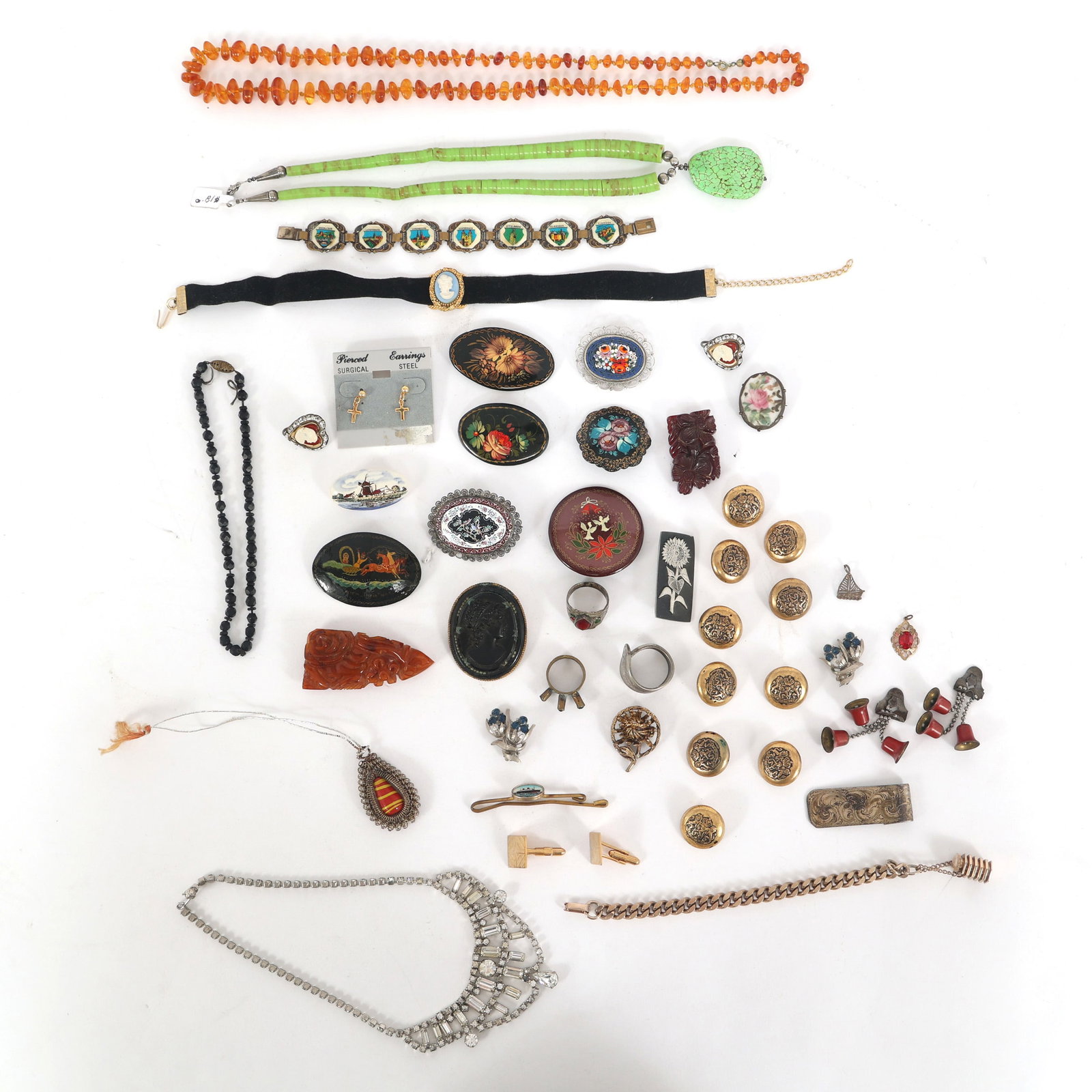 COSTUME FASHION JEWELRY: COSTUME FASHION JEWELRY Costume fashion jewelry includes: Necklaces Earrings Bracelets Brooches Tie Clips Cuff links Buttons