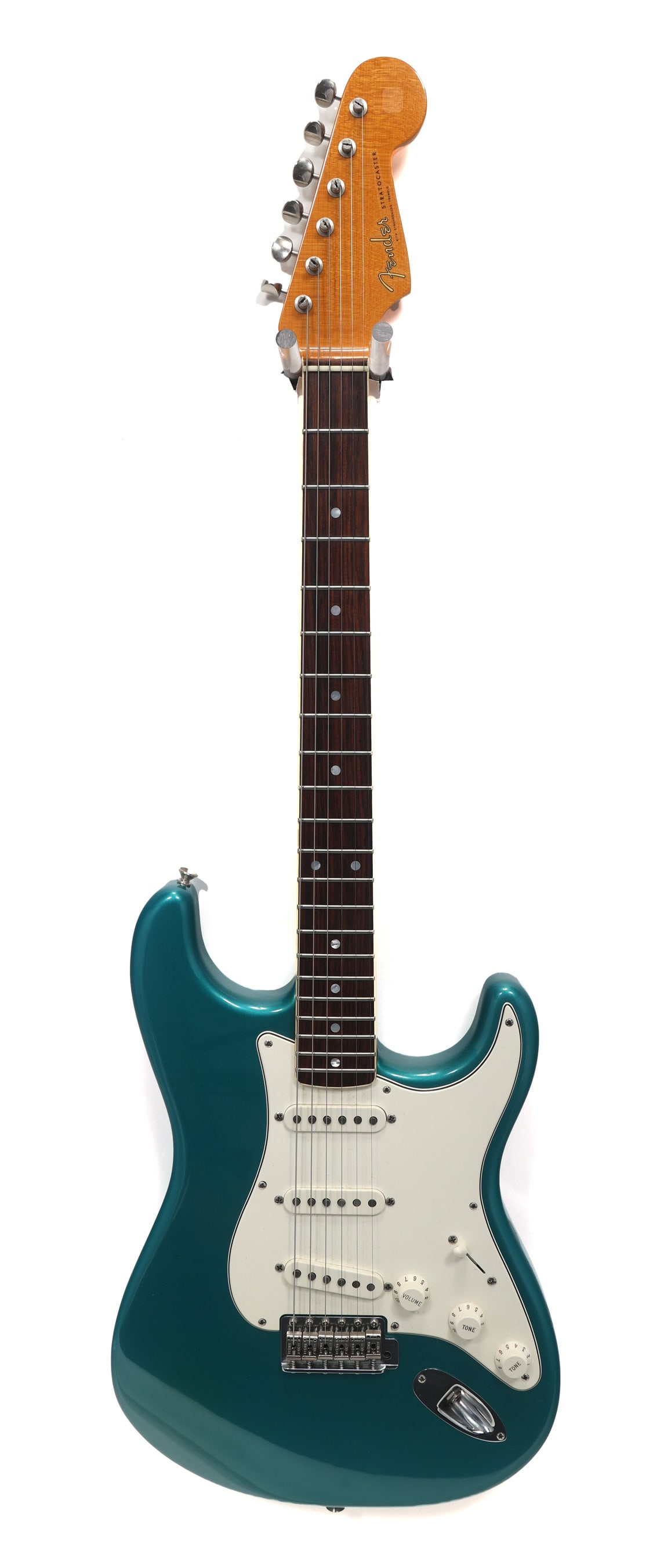 FENDER STRATOCASTER ERIC JOHNSON ELECTRIC GUITAR: FENDER STRATOCASTER ERIC JOHNSON ELECTRIC GUITAR Fender Stratocaster Eric Johnson electric guitar. Teal lacquer body, white pickguard. Includes tan and brown leather hard case. Body: Solid Includ