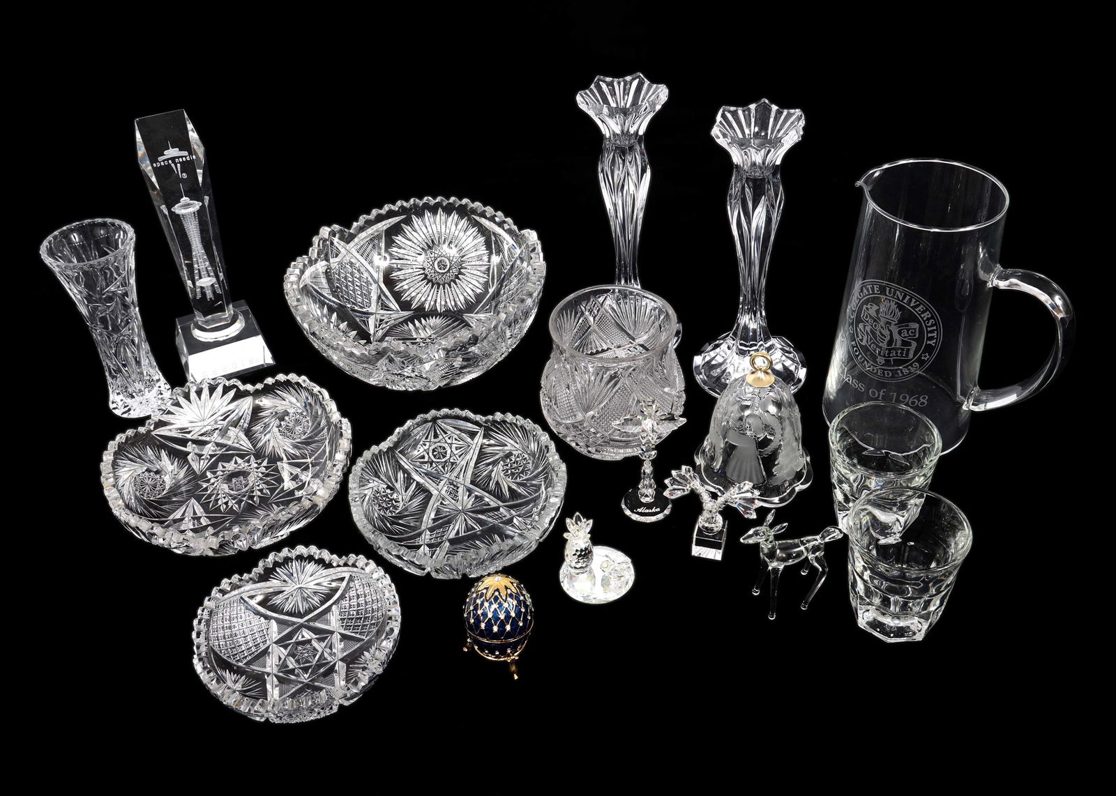 CRYSTAL & GLASS SERVEWARE, FIGURINES, & MORE: CRYSTAL & GLASS SERVEWARE, FIGURINES, & MORE (18) Crystal & glass items: Eagle figurine (2.5 x 1.5 x 2.75") Alaskan souvenir Totem Pole (2 x 1.25 x 3.75") Maui pineapple & oyster (2 x 2