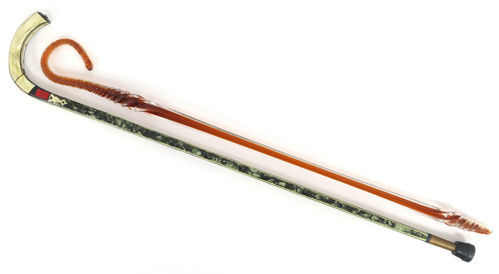 20TH CENTURY GLASS WALKING STICK & PEARLESCENT CANE: 20TH CENTURY GLASS WALKING STICK & PEARLESCENT CANE 20th Century glass walking stick & pearlescent cane: Shepherd's hook glass walking stick (32") Shepherd's pearlescent cane with brass cuff