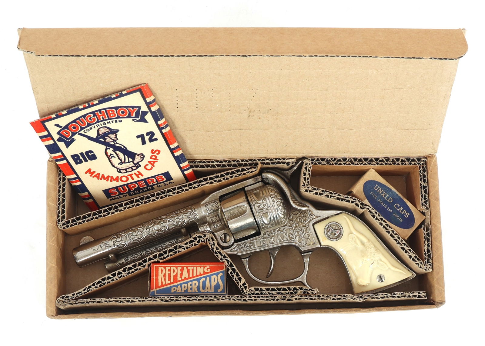 TEXAN CAP GUN WITH PAPER CAPS: TEXAN CAP GUN WITH PAPER CAPS Texan cap gun with accessories: Doughboy Big 72 Mammoth Superb Caps UnXld Caps in original box Star brand roll caps in the original box Size: 9.5
