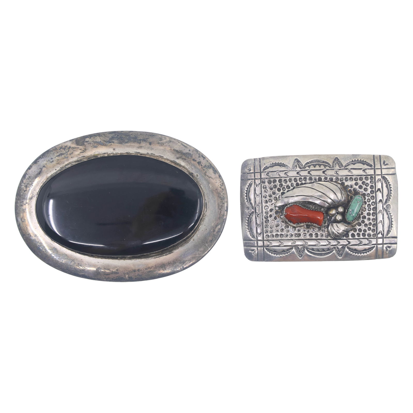 STERLING SILVER BELT BUCKLES: STERLING SILVER BELT BUCKLES Sterling silver belt buckles: Black onyx buckle (4.25" x 3") Turquoise & coral buckle (3" x 2") Weight: 152g