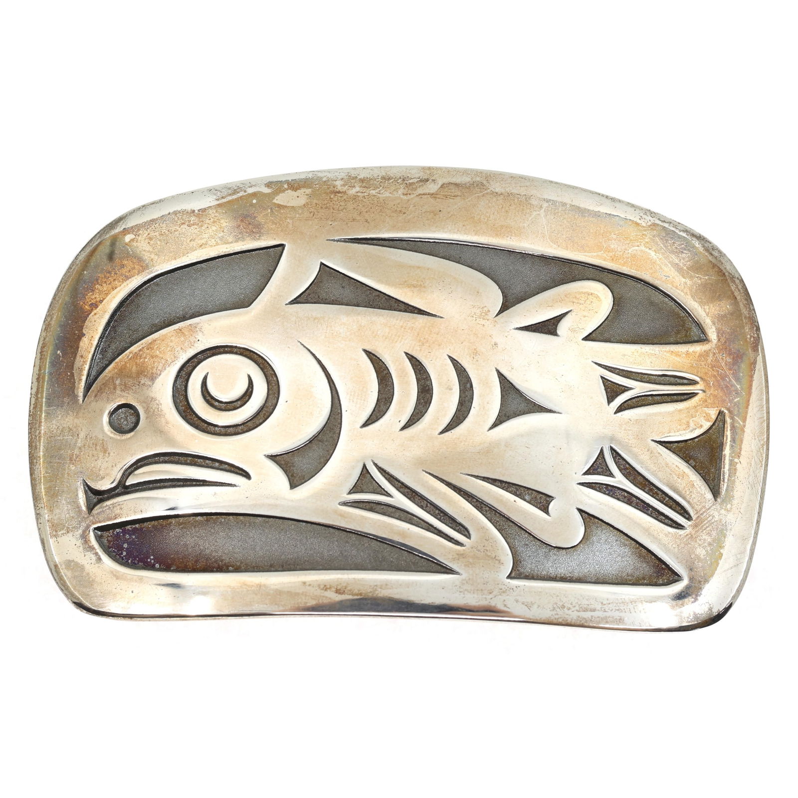 STERLING SILVER MAG HAIDA-STYLE SALMON BELT BUCKLE: STERLING SILVER MAG HAIDA-STYLE SALMON BELT BUCKLE Sterling silver Haida-style salmon belt buckle byMAG (Metal Arts Guild) (2" x 3.25") Weight: 65g