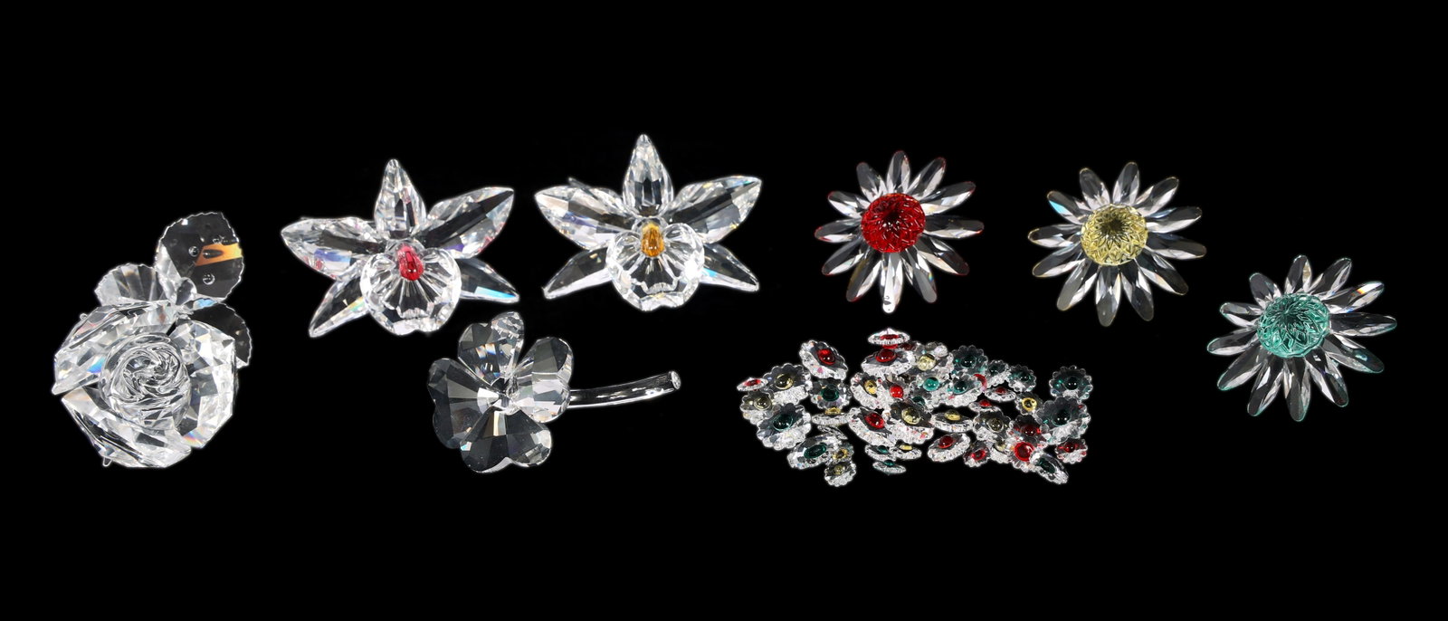 SWAROVSKI CRYSTAL FLORAL FIGURINES: SWAROVSKI CRYSTAL FLORAL FIGURINES (8) Swarovski Crystal floral figurines: Exquisite Accents Orchid deep pink (3") Exquisite Accents Orchid dark yellow (3") In The Secr