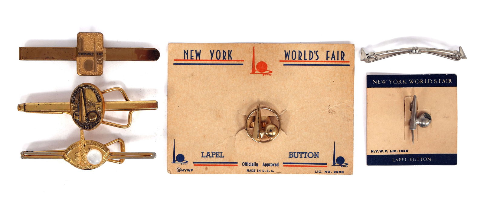 NEW YORK WORLD'S FAIR 1939 TIE CLIPS & LAPEL PINS (1 of 4)