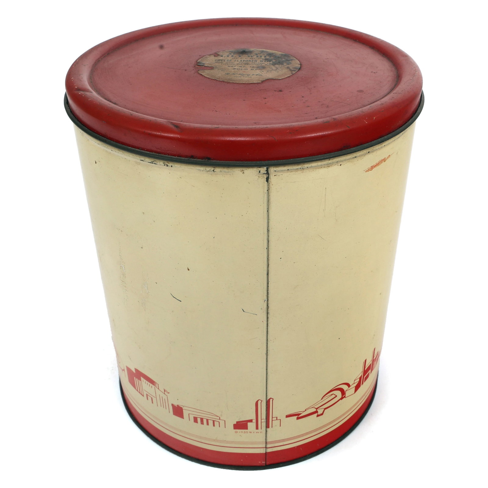 NY WORLD'S FAIR 1939 MACY'S LILY WHITE TIN CANISTER: NY WORLD'S FAIR 1939 MACY'S LILY WHITE TIN CANISTER 1939 New York World's Fair Macy's Lily White tin canister for cheese flavored waffles. Size: 7.75" x 6.5"
